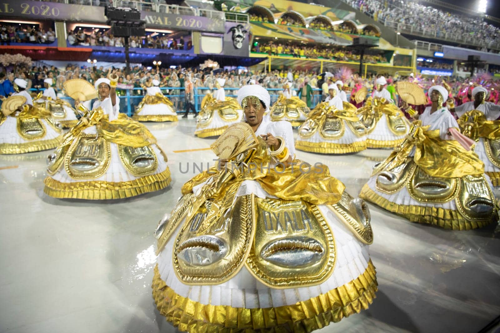 Rio de Janeiro, Brasil-  February 29, 2020: Samba Parade at the 2020 Carnival Champions Parade, Sambodromo. It's raining