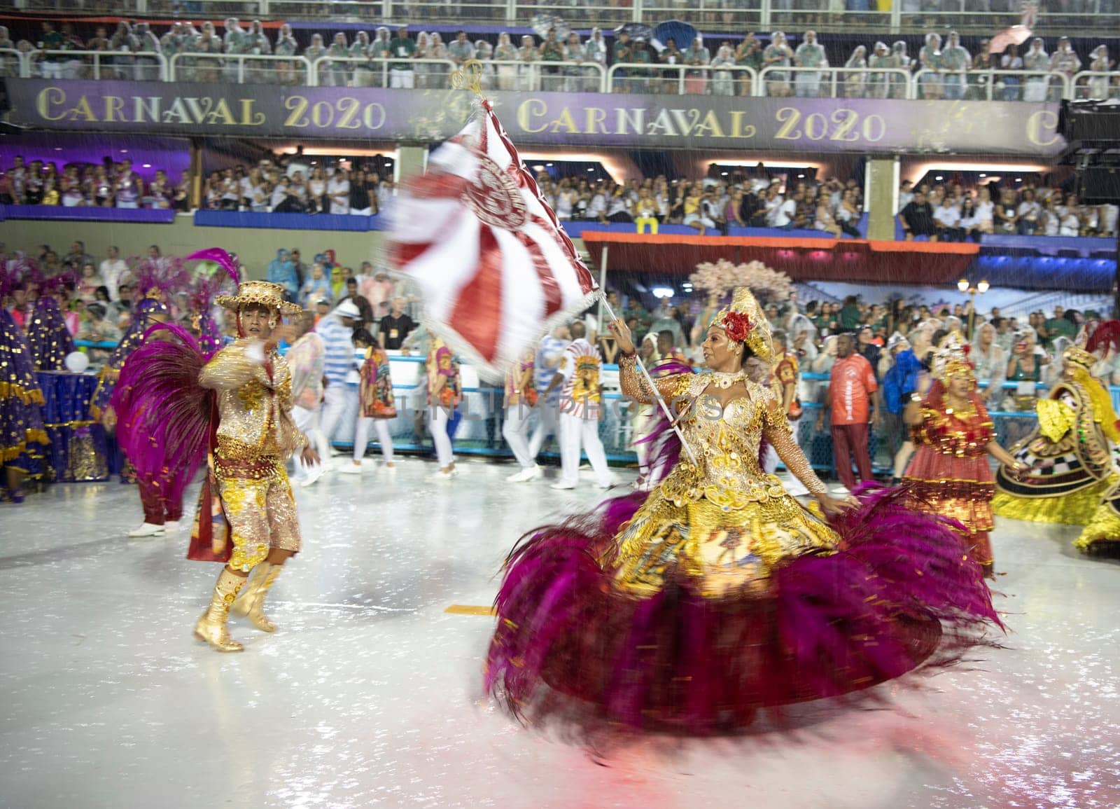Rio de Janeiro, Brasil-  February 29, 2020: Samba Parade at the 2020 Carnival Champions Parade, Sambodromo. It's raining
