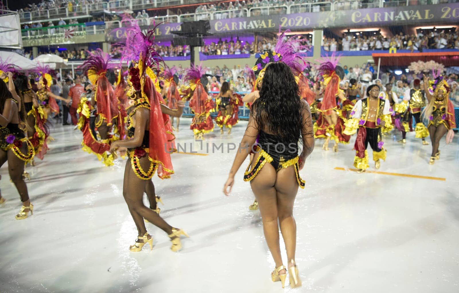 Rio de Janeiro, Brasil-  February 29, 2020: Samba Parade at the 2020 Carnival Champions Parade, Sambodromo. It's raining