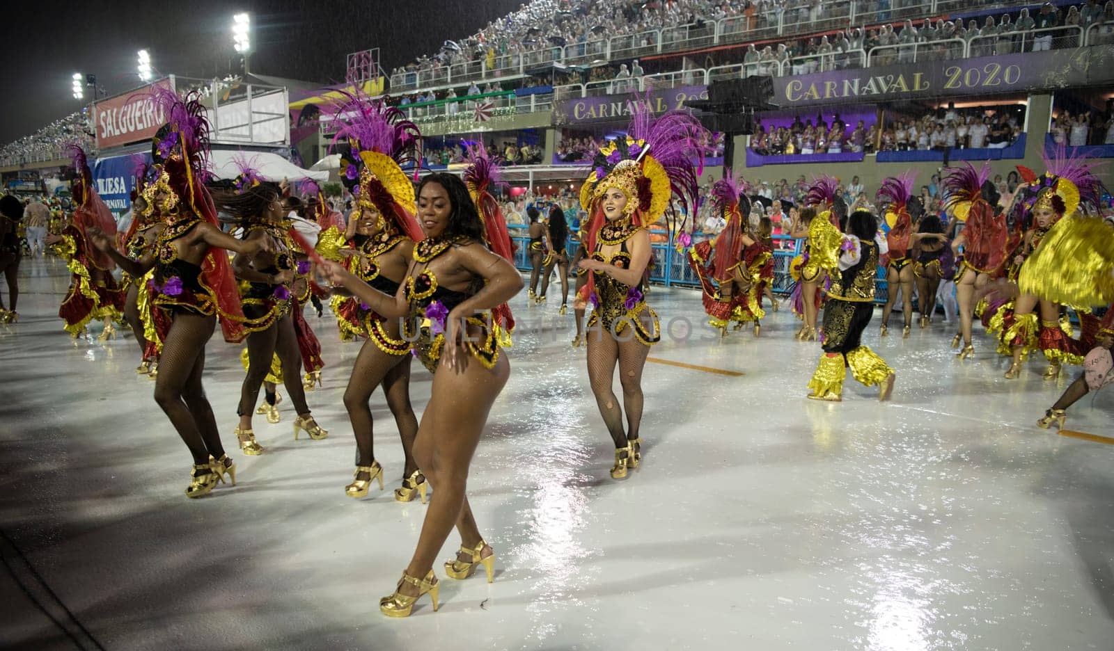 Rio de Janeiro, Brasil-  February 29, 2020: Samba Parade at the 2020 Carnival Champions Parade, Sambodromo. It's raining