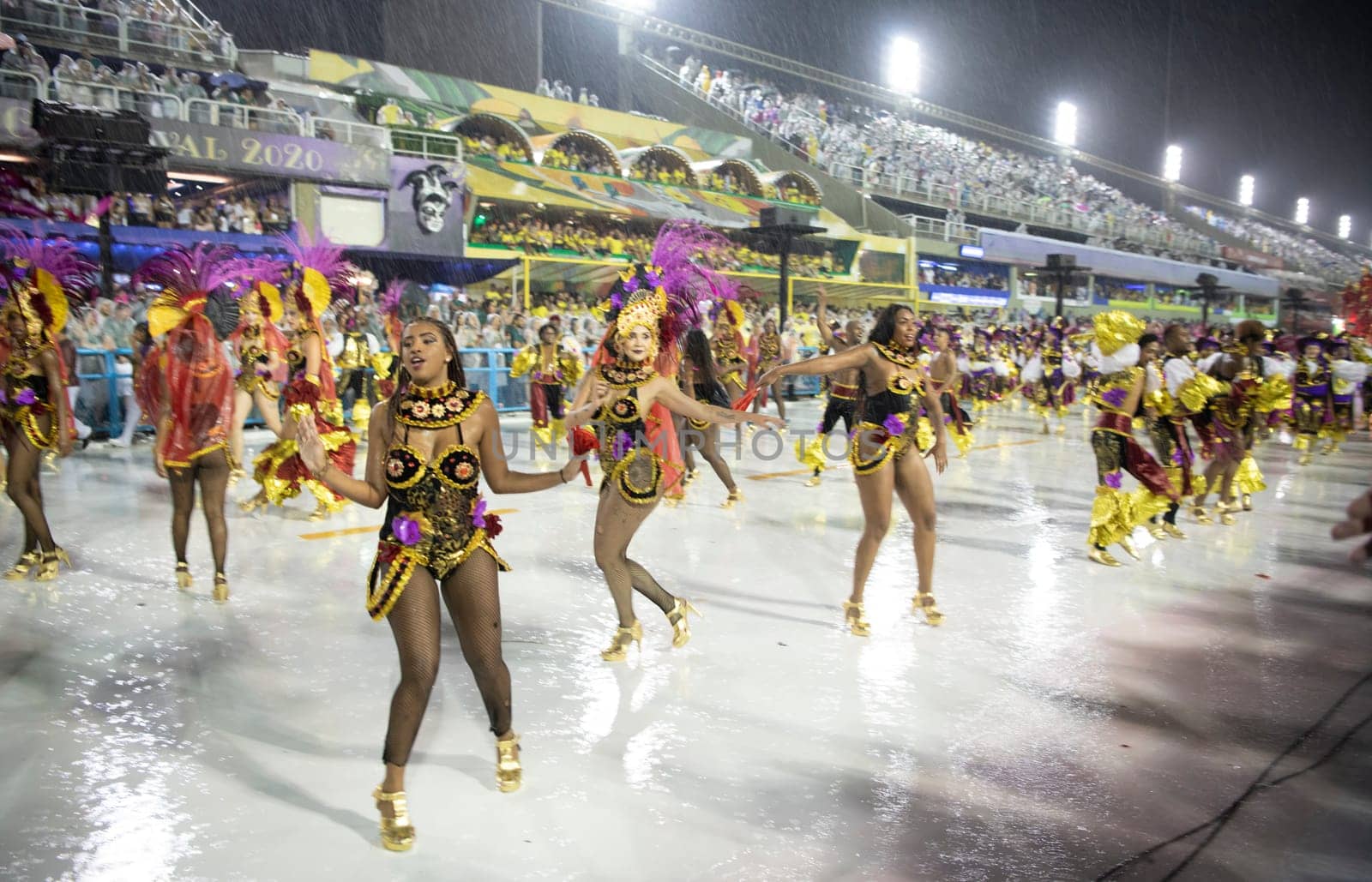 Rio de Janeiro, Brasil-  February 29, 2020: Samba Parade at the 2020 Carnival Champions Parade, Sambodromo. It's raining