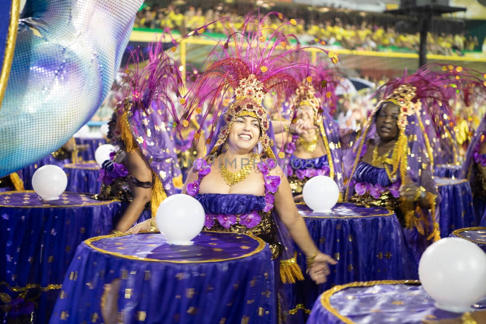 Rio de Janeiro, Brasil-  February 29, 2020: Samba Parade at the 2020 Carnival Champions Parade, Sambodromo. It's raining
