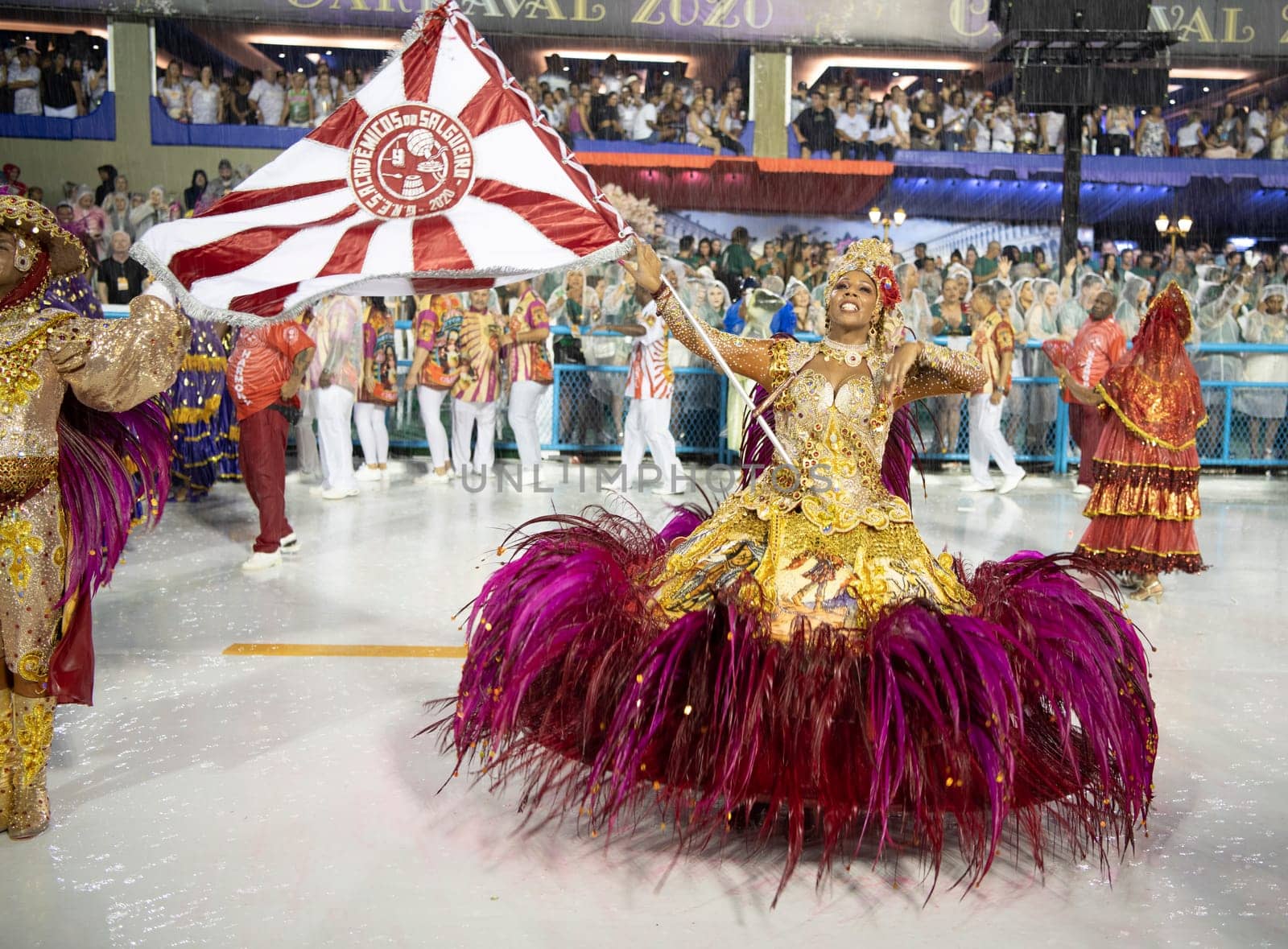 Rio de Janeiro, Brasil-  February 29, 2020: Samba Parade at the 2020 Carnival Champions Parade, Sambodromo. It's raining