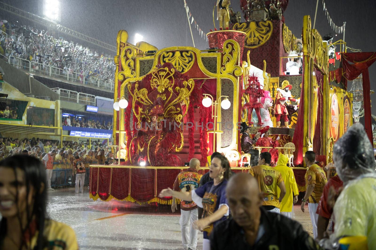 Rio de Janeiro, Brasil-  February 29, 2020: Samba Parade at the 2020 Carnival Champions Parade, Sambodromo. It's raining