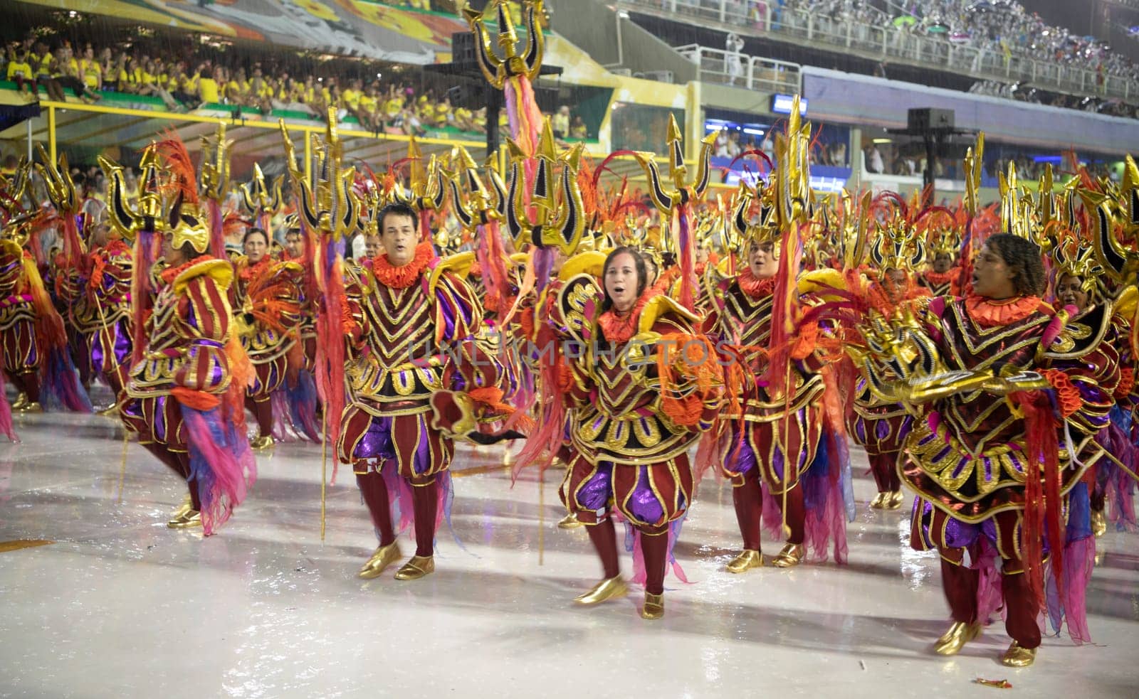 Rio de Janeiro, Brasil-  February 29, 2020: Samba Parade at the 2020 Carnival Champions Parade, Sambodromo. It's raining