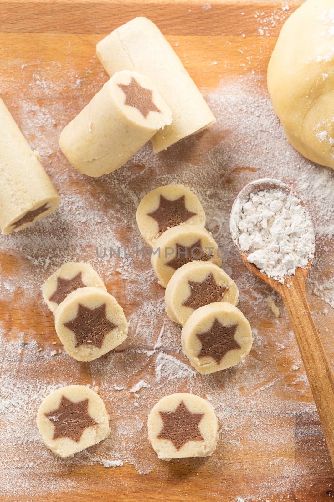 Baking christmas cookies with chocolate star. Homemade bakery, xmas sweet, winter holidays concept.