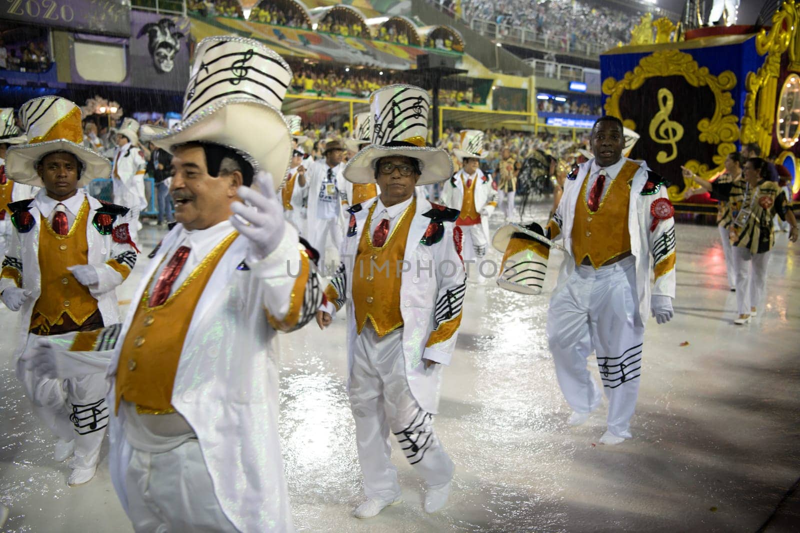Rio de Janeiro, Brasil-  February 29, 2020: Samba Parade at the 2020 Carnival Champions Parade, Sambodromo. It's raining