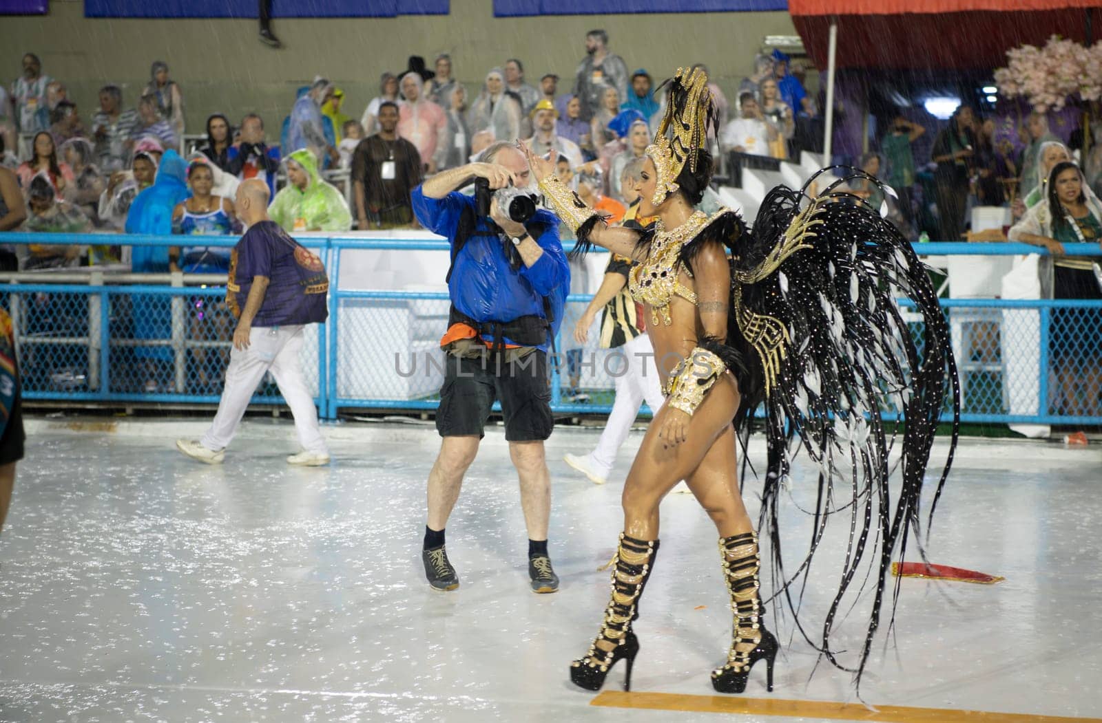Rio de Janeiro, Brasil-  February 29, 2020: Samba Parade at the 2020 Carnival Champions Parade, Sambodromo. It's raining