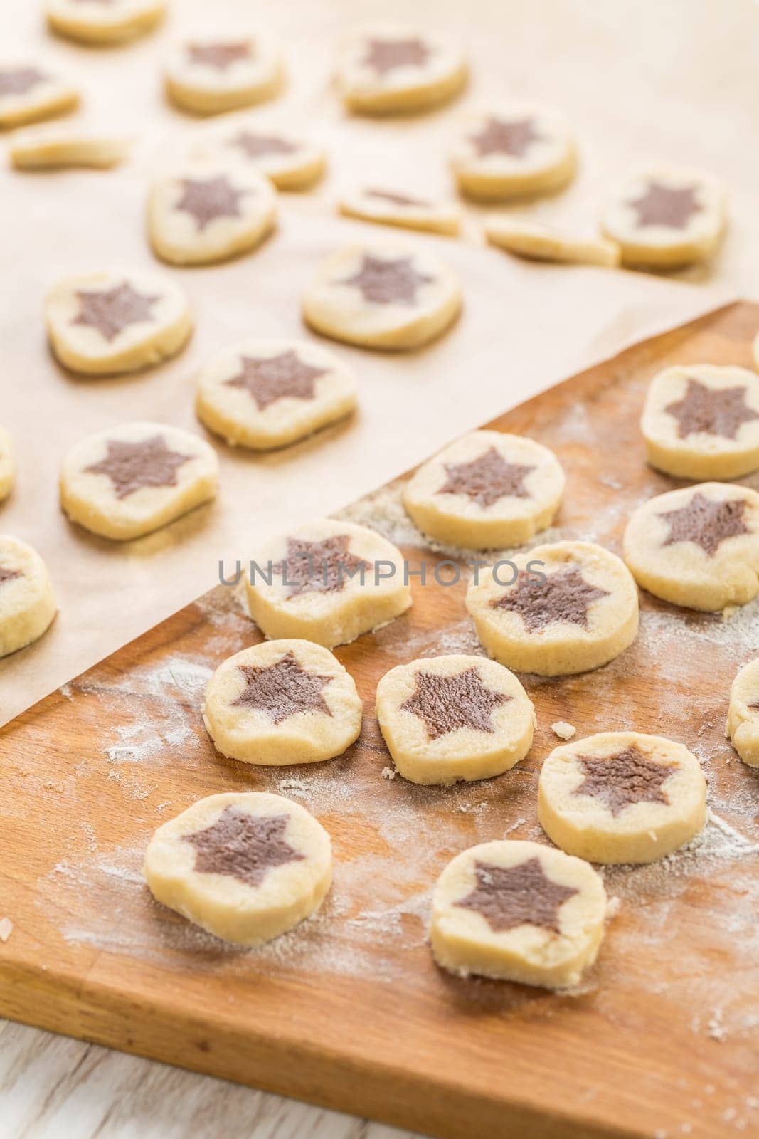 Baking christmas cookies with chocolate star. Homemade bakery, xmas sweet, winter holidays concept.