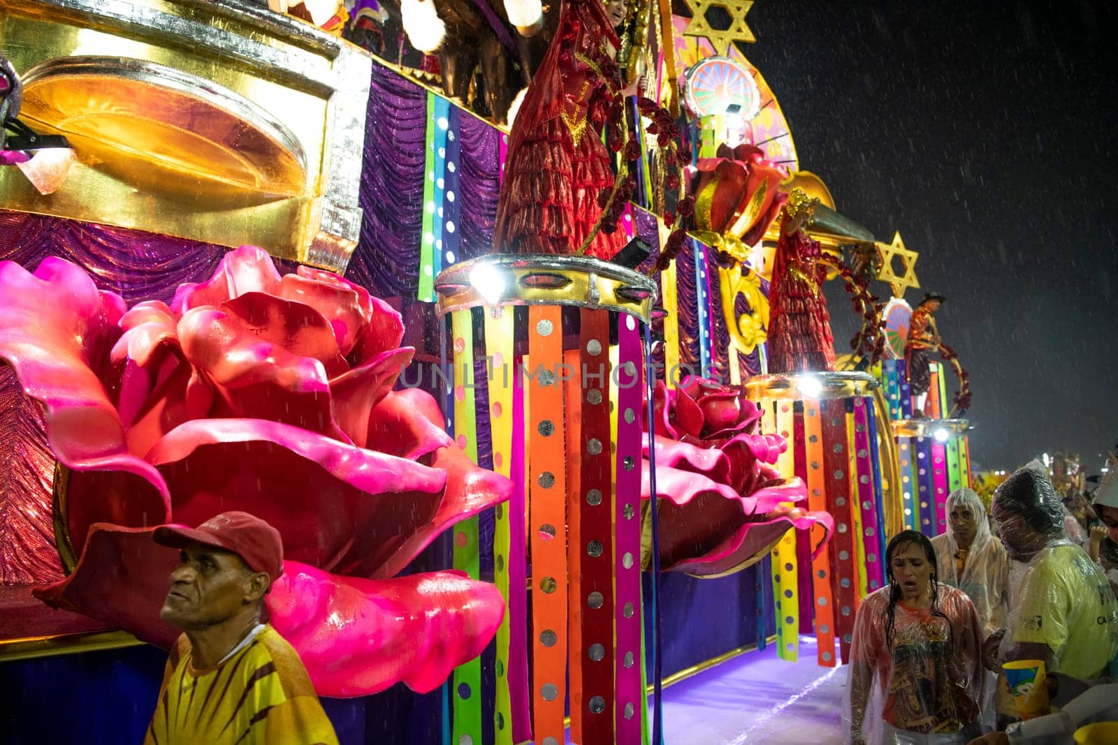 Rio de Janeiro, Brasil-  February 29, 2020: Samba Parade at the 2020 Carnival Champions Parade, Sambodromo. It's raining