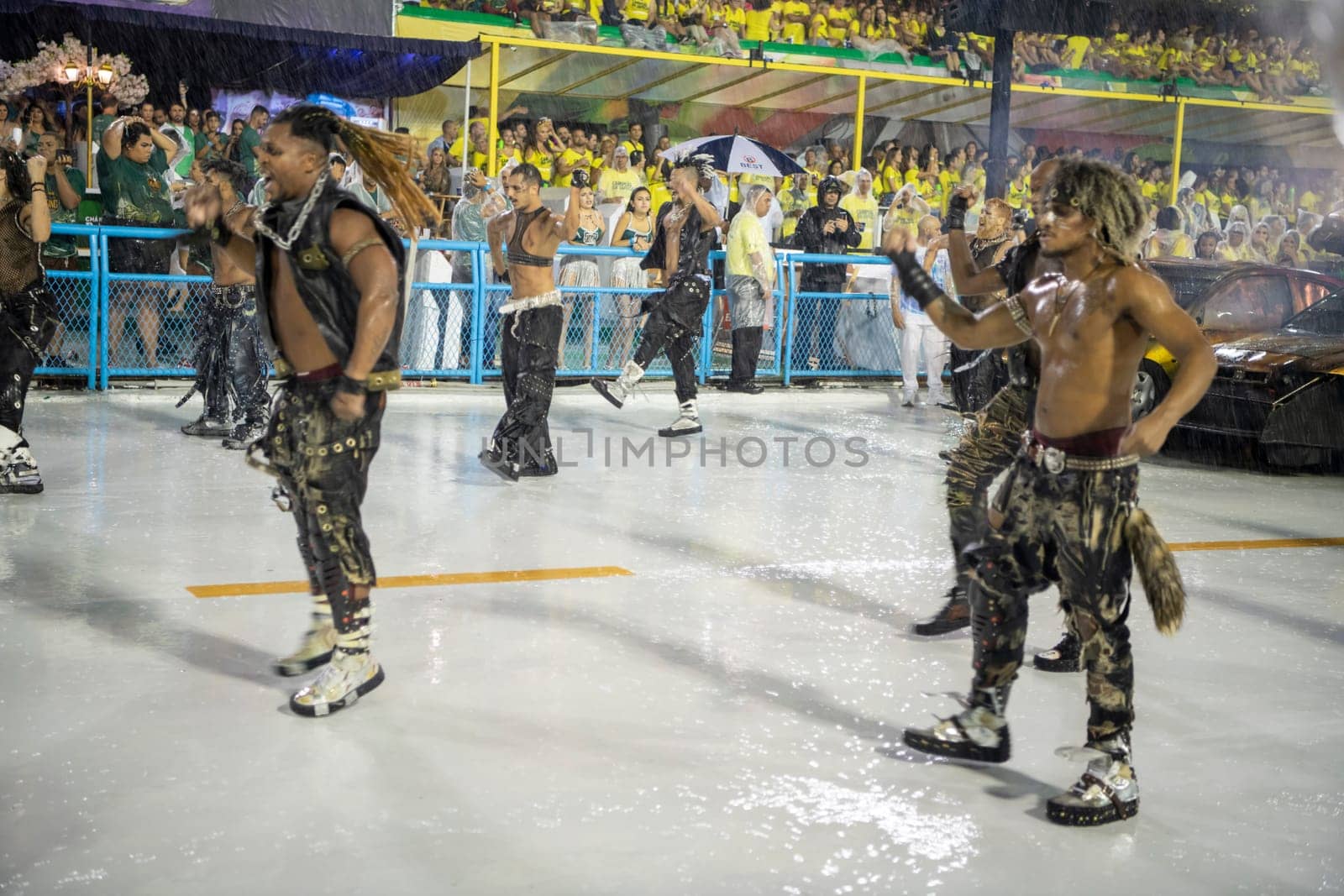 Rio de Janeiro, Brasil-  February 29, 2020: Samba Parade at the 2020 Carnival, Champions Parade, Sambodromo. It's raining