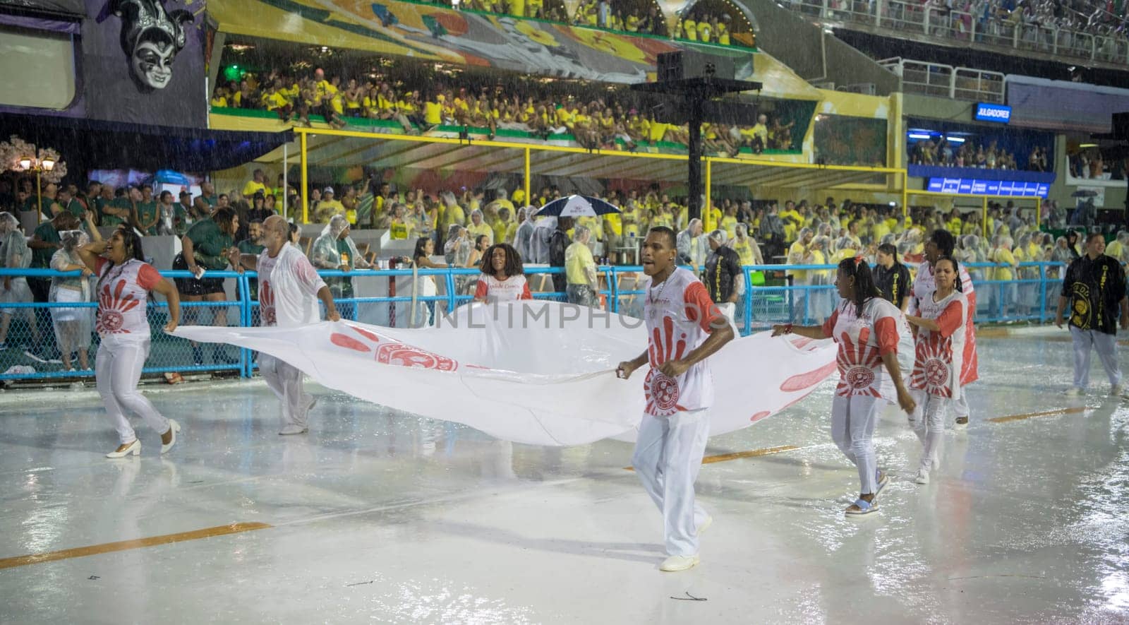 Rio de Janeiro, Brasil-  February 29, 2020: Samba Parade at the 2020 Carnival, Champions Parade, Sambodromo. It's raining