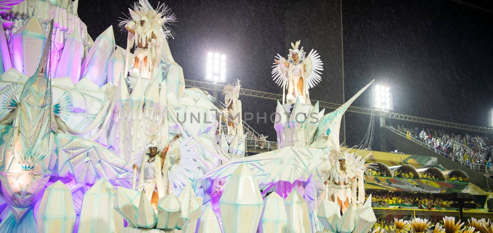 Rio de Janeiro, Brasil-  February 29, 2020: Samba Parade at the 2020 Carnival, Champions Parade, Sambodromo. It's raining