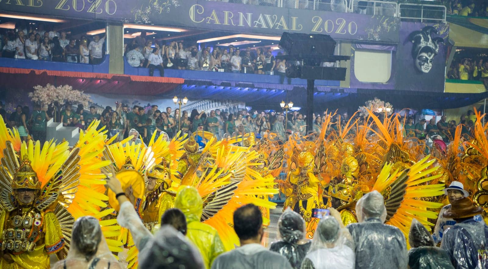 Rio de Janeiro, Brasil-  February 29, 2020: Samba Parade at the 2020 Carnival, Champions Parade, Sambodromo. It's raining