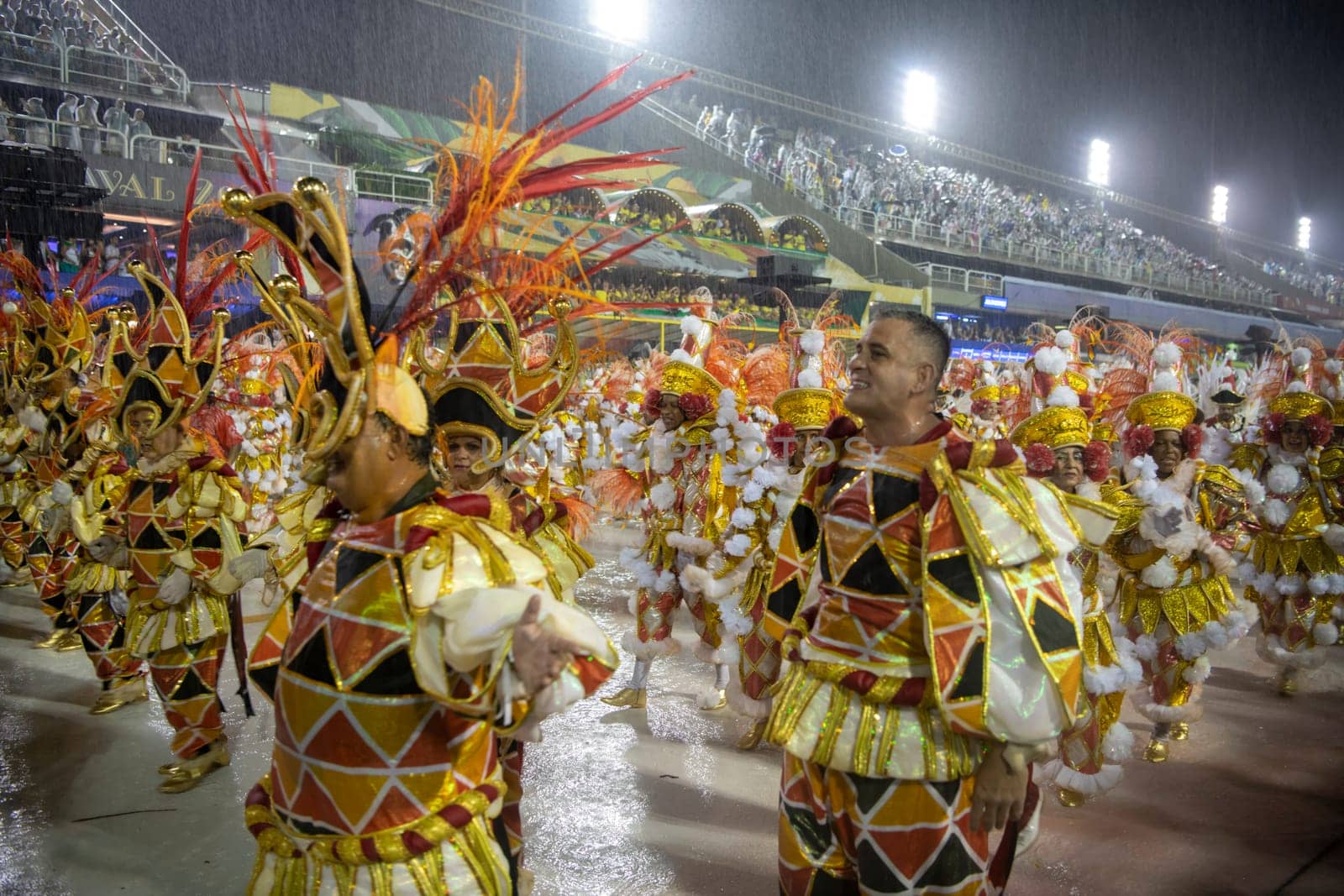 Rio de Janeiro, Brasil-  February 29, 2020: Samba Parade at the 2020 Carnival,Champions Parade, Sambodromo. It's raining