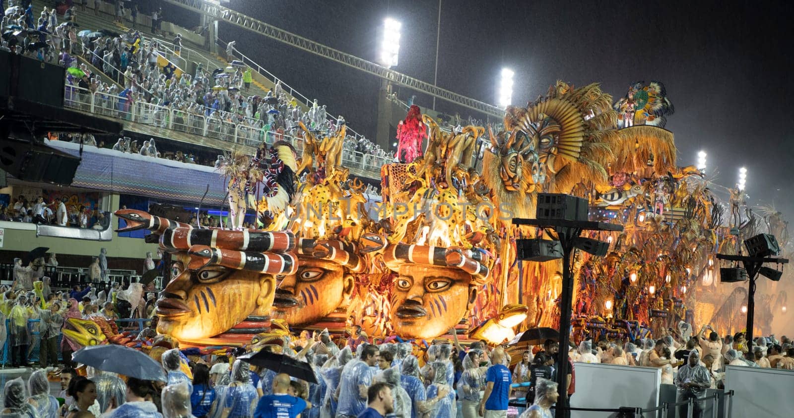 Rio de Janeiro, Brasil-  February 29, 2020: Samba Parade at the 2020 Carnival, Champions Parade, Sambodromo. It's raining