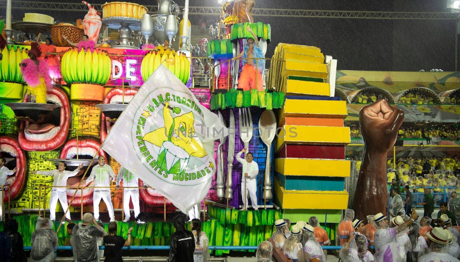 Rio de Janeiro, Brasil-  February 29, 2020: Samba Parade at the 2020 Carnival, Champions Parade, Sambodromo. It's raining