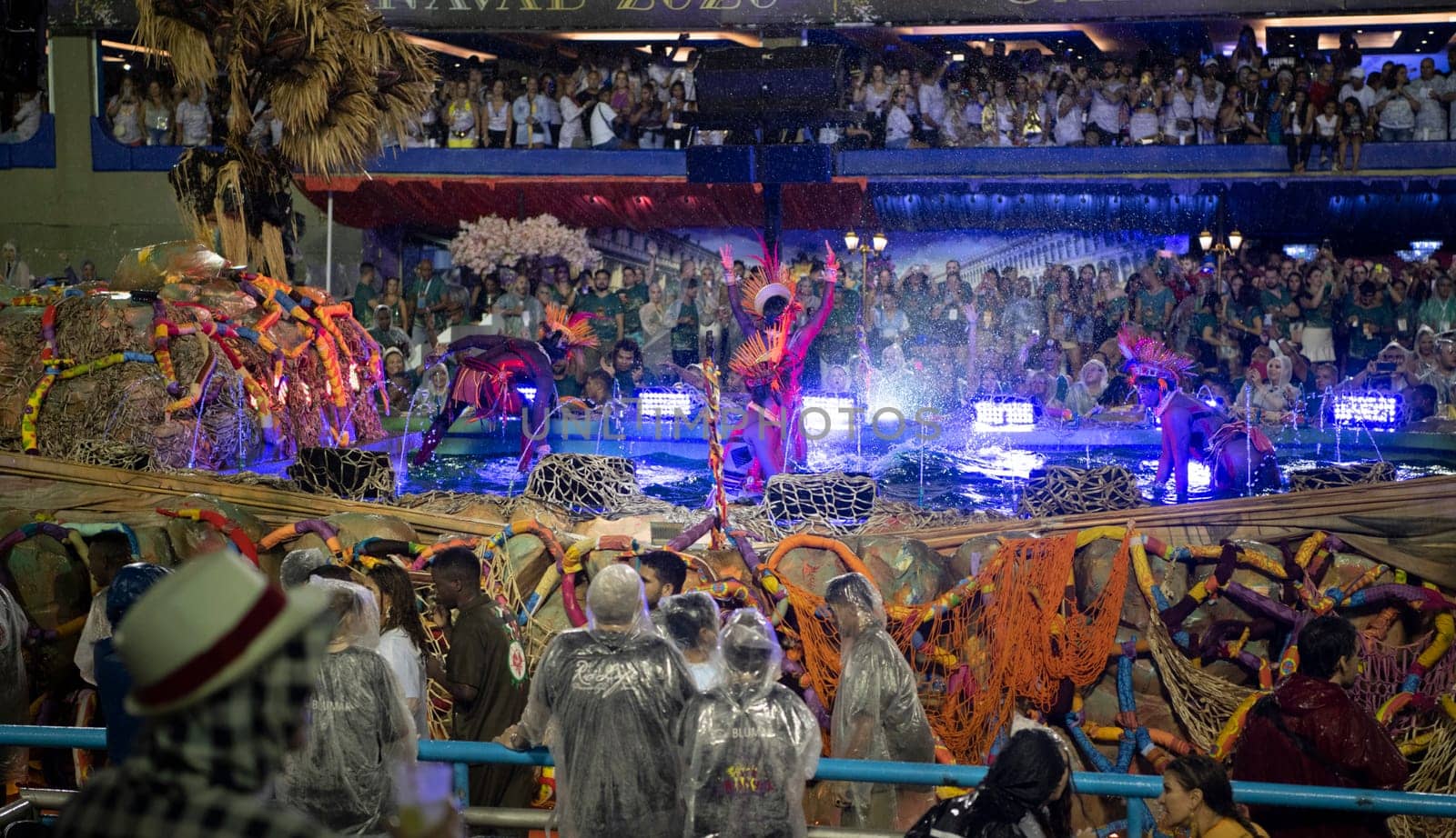 Rio de Janeiro, Brasil-  February 29, 2020: Samba Parade at the 2020 Carnival, Champions Parade, Sambodromo. It's raining