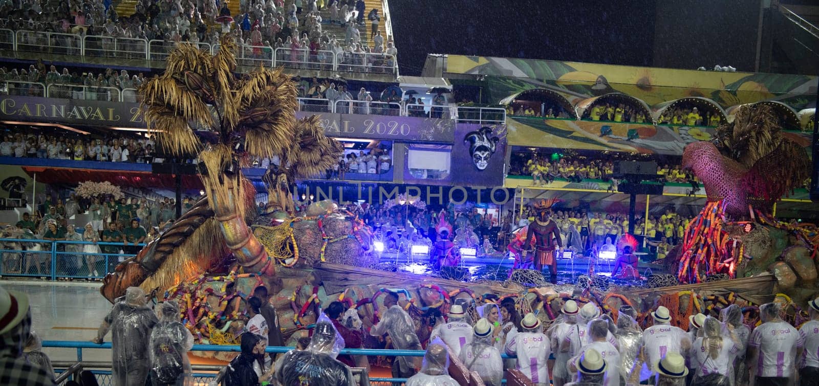 Rio de Janeiro, Brasil-  February 29, 2020: Samba Parade at the 2020 Carnival, Champions Parade, Sambodromo. It's raining