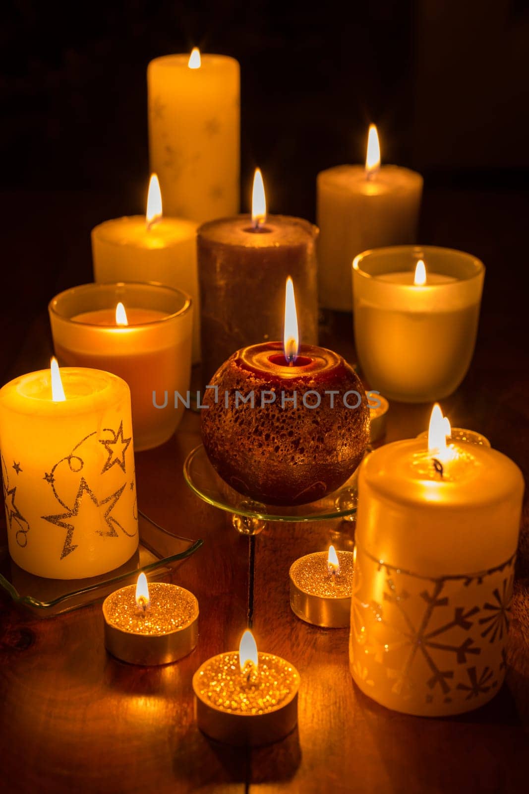 Candles on wooden background. Candlelights for Christmas.