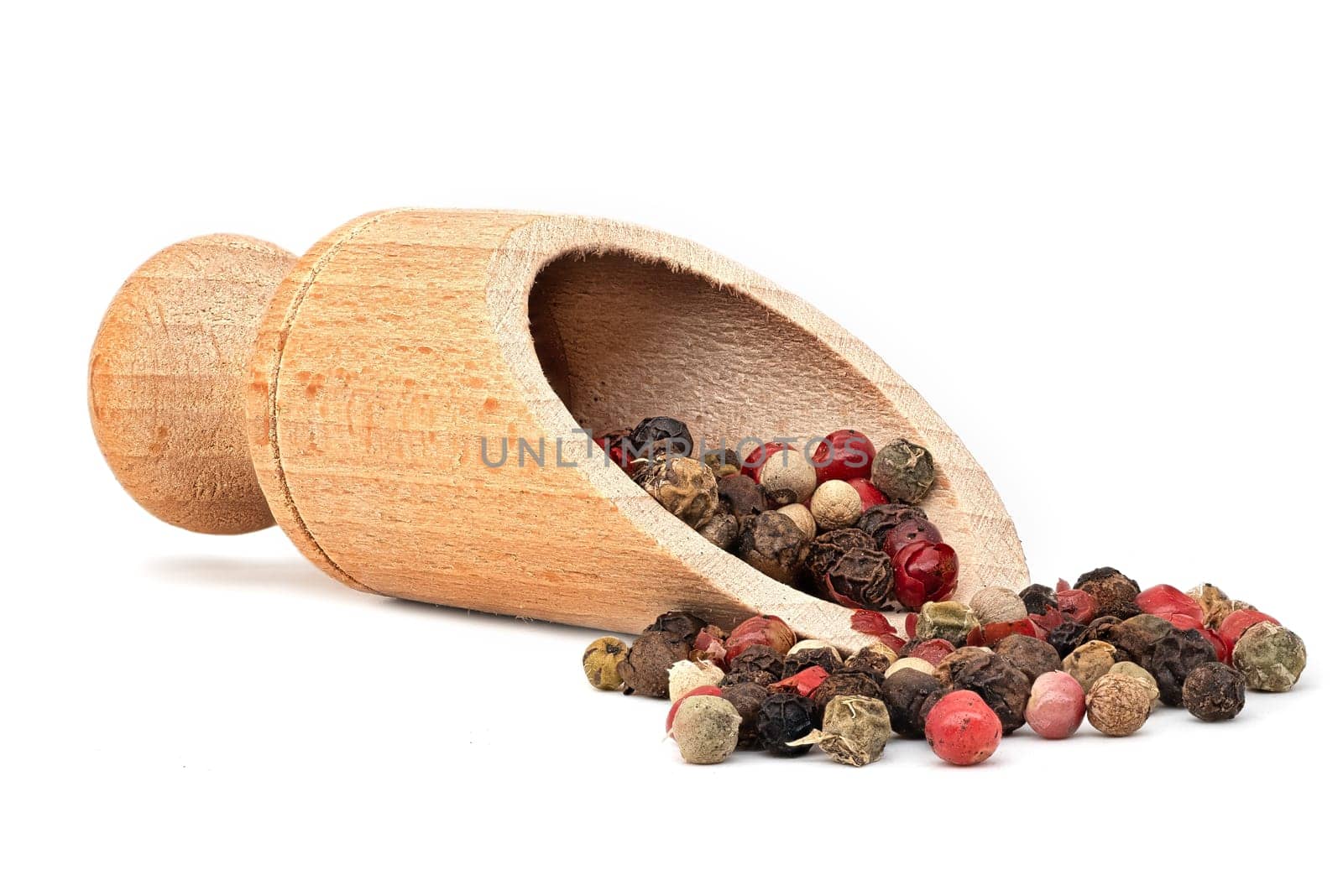 Peppercorn Mixed Colors, close up of ingredient with wooden showel on white background