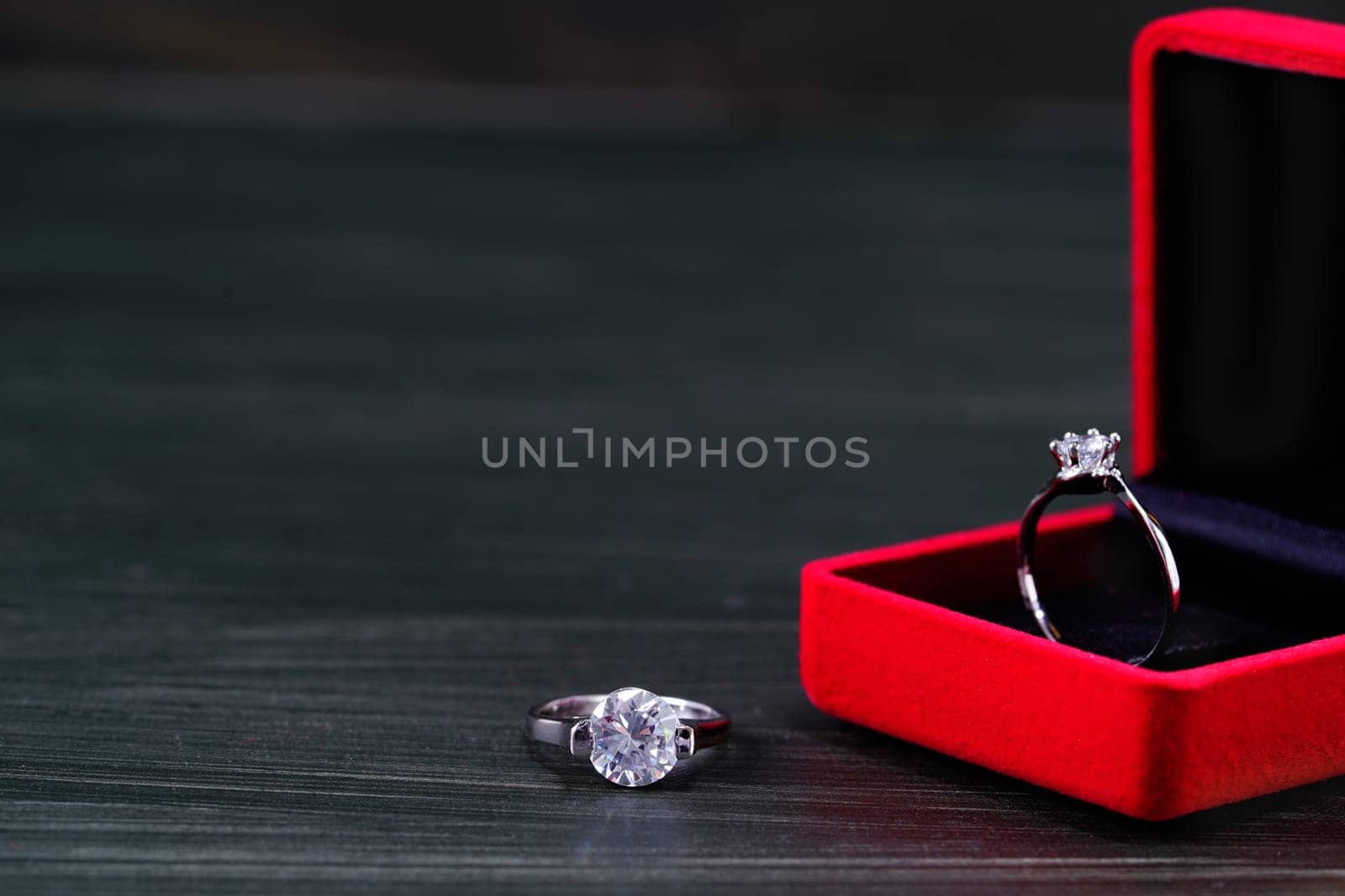 Close up diamond ring in red jewel box