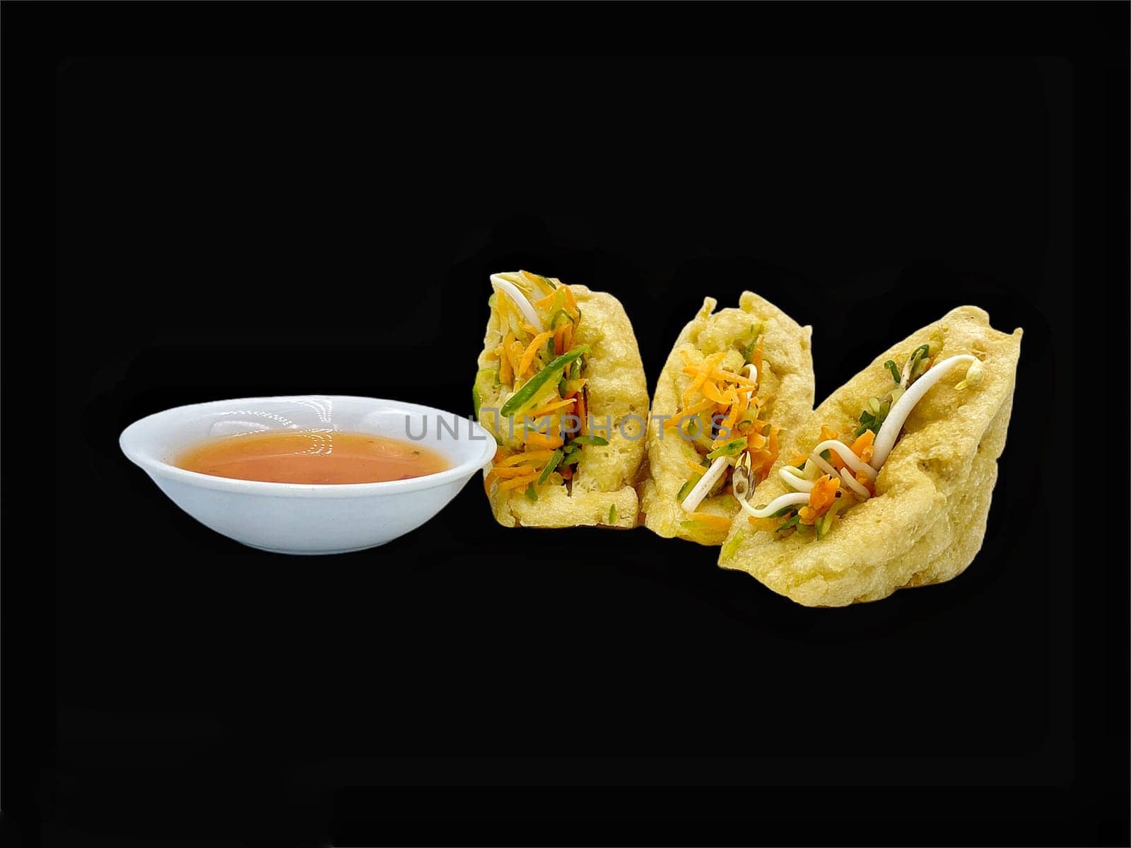 Malay cuisine or Stuffed Tofu called Tauhu sumbat on black background
