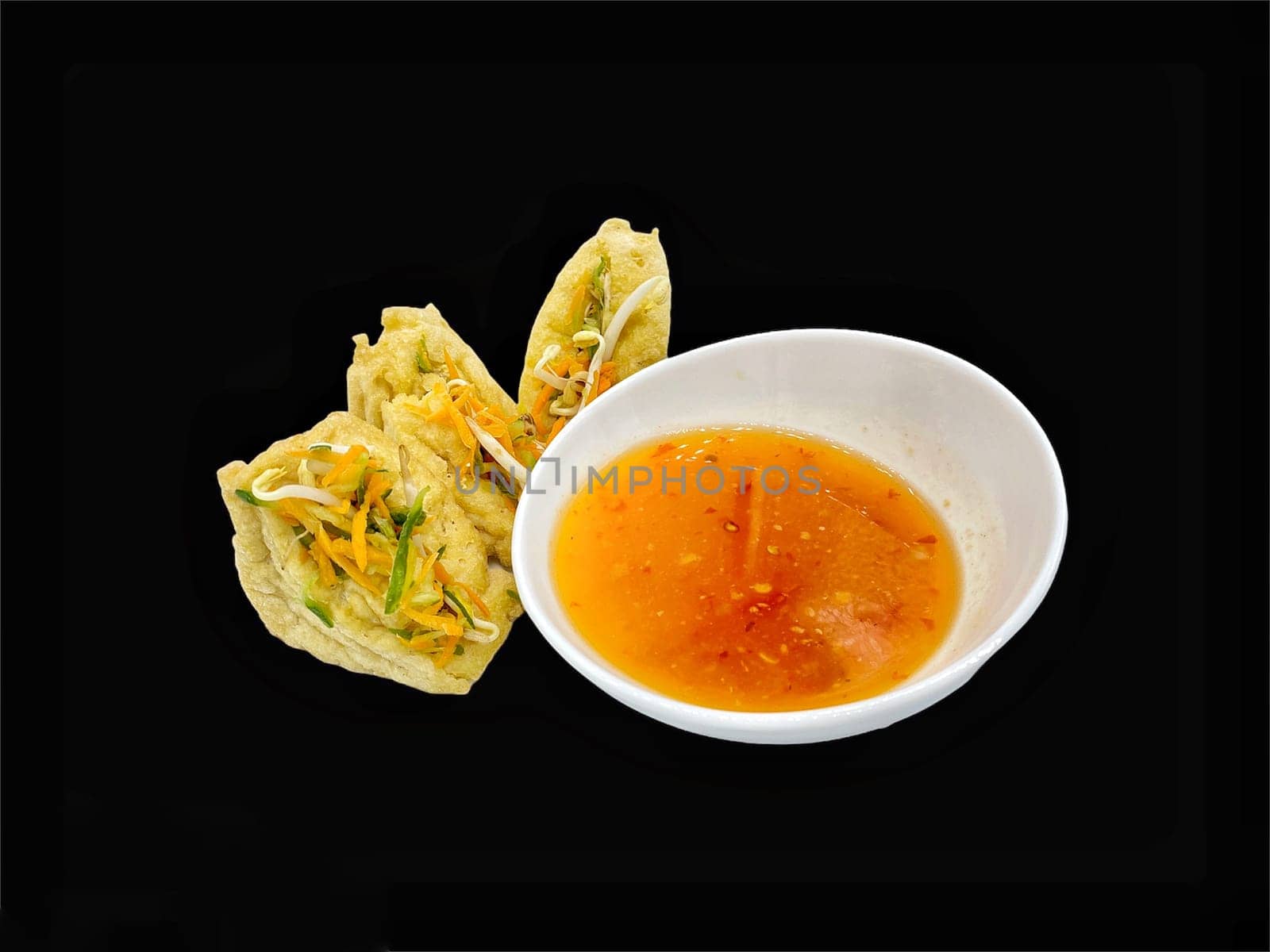 Malay cuisine or Stuffed Tofu called Tauhu sumbat on black background