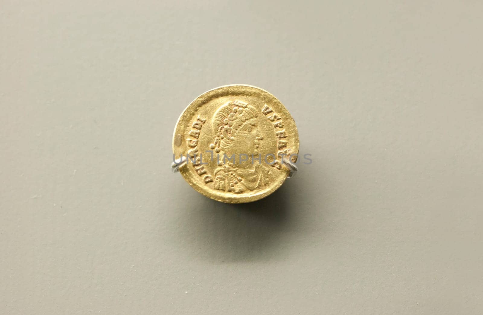 Merida, Spain - Nov 14th, 2020: Arcadius Roman Emperor coin. National Museum of Roman Art in Merida, Spain