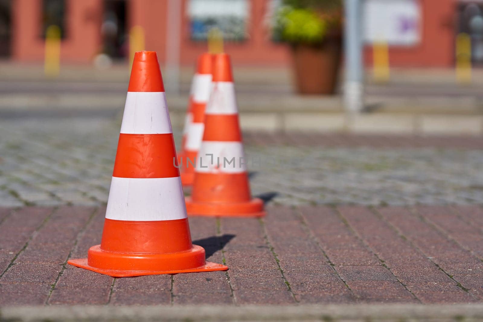 Barrier with traffic cones at a road construction site in Swinoujscie in Poland