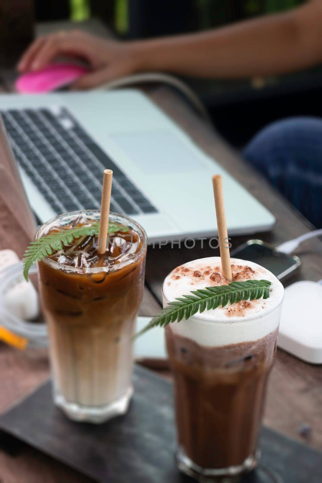 Coffee glass decorated with fern leaf, stock photo