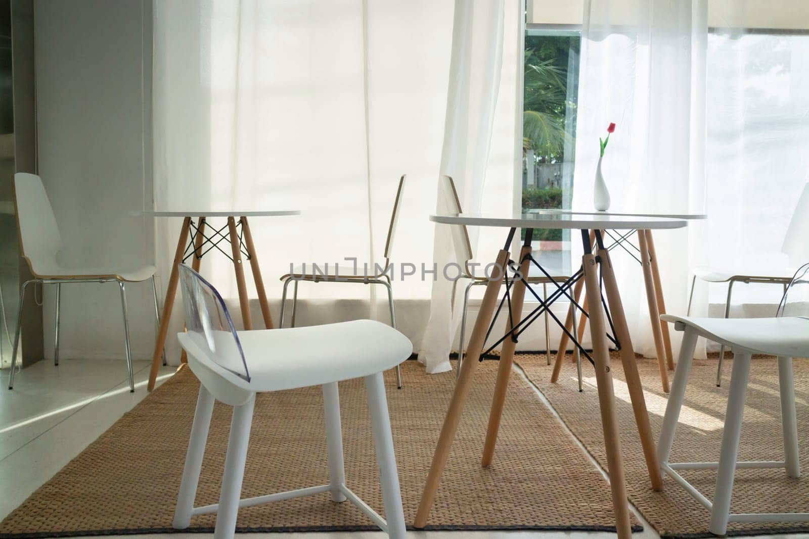 Table and seat in co-working space, stock photo