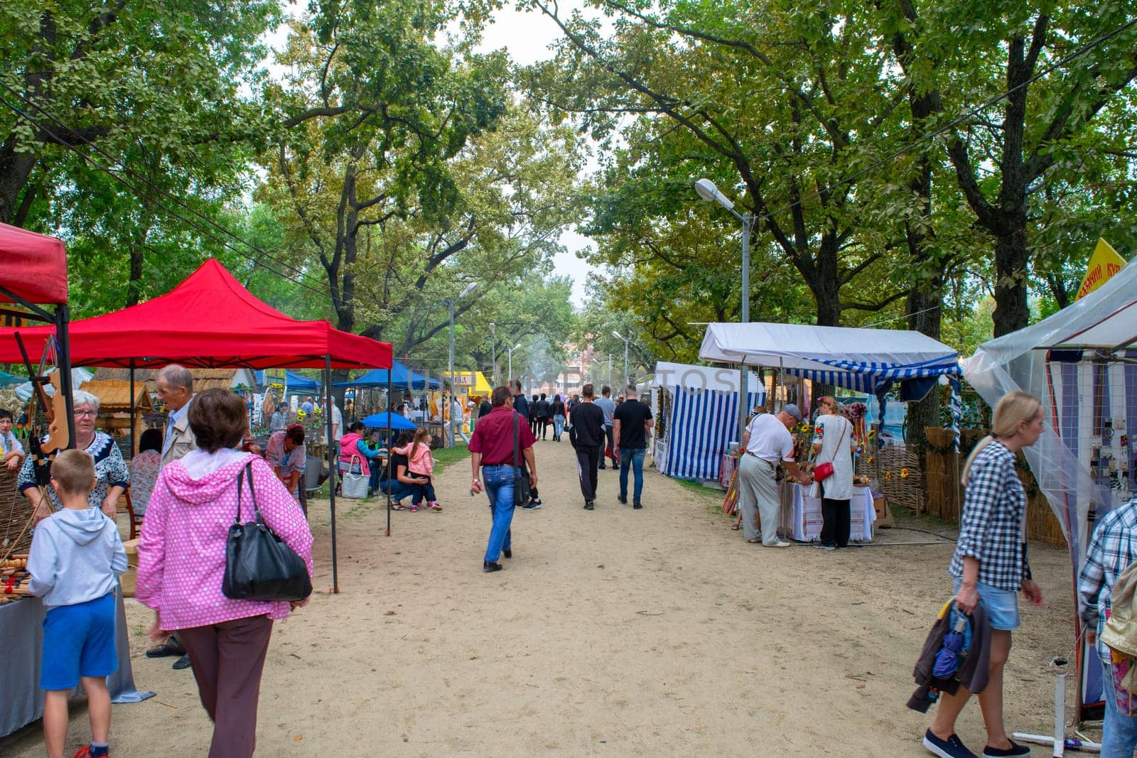 Slavyansk-on-Kuban, Russia - September 14, 2018: Day of the city of Slavyansk-on-Kuban, folk festivities in the city park. Representation of rural settlements in national traditions.