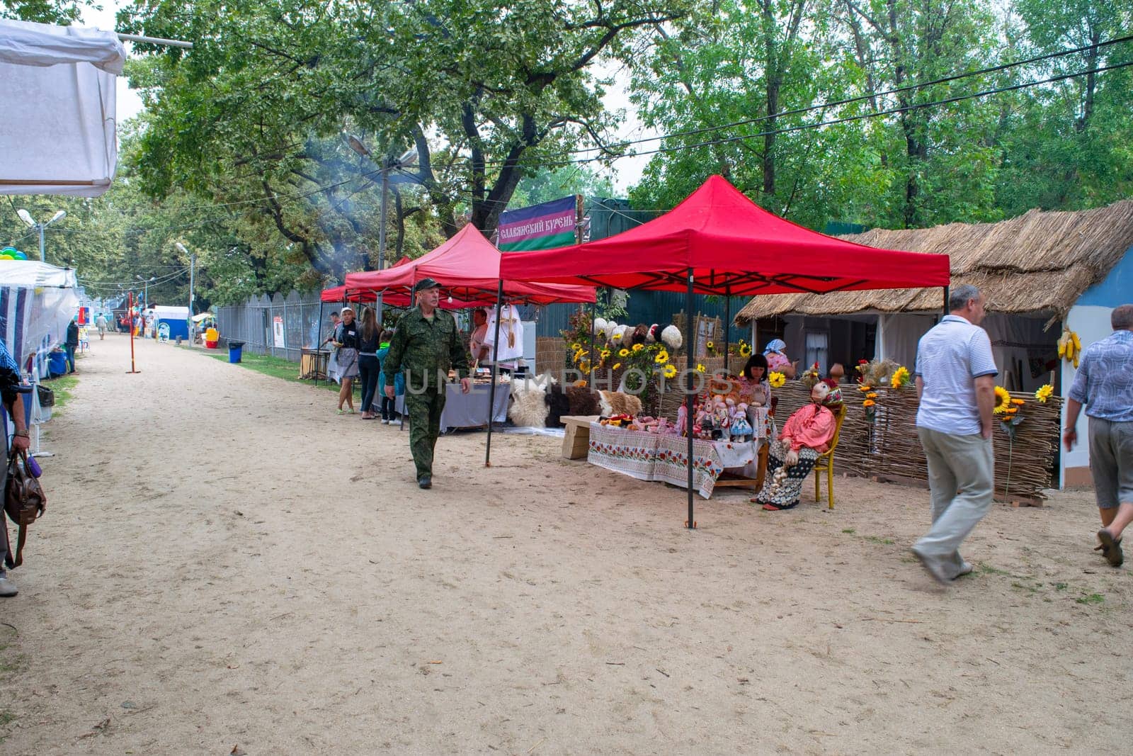 Slavyansk-on-Kuban, Russia - September 14, 2018: Day of the city of Slavyansk-on-Kuban, folk festivities in the city park. Representation of rural settlements in national traditions.