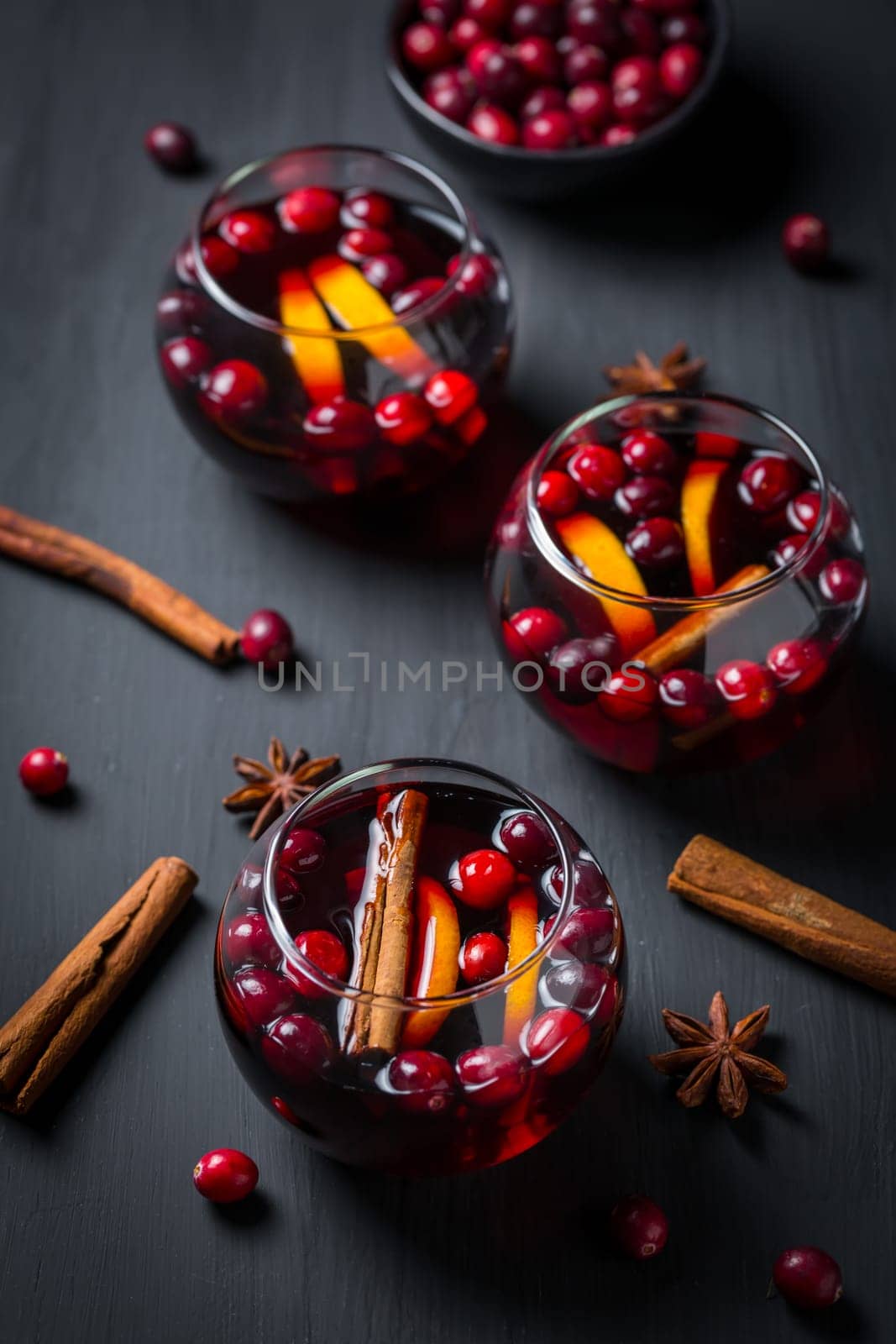 Mulled wine with orange, cranberries and cinnamon and anise