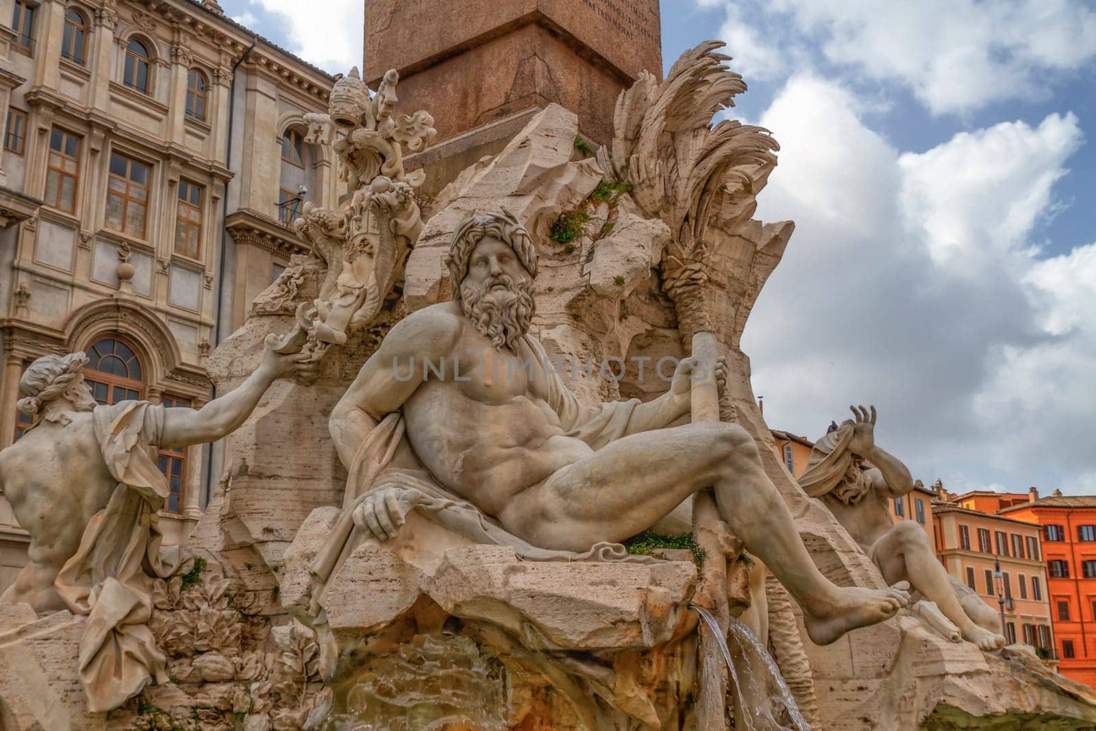 Close upon fountain of the Four Rivers, Fontana dei Quattro Fiumi, by day in Piazza Navona, Rome, Italy