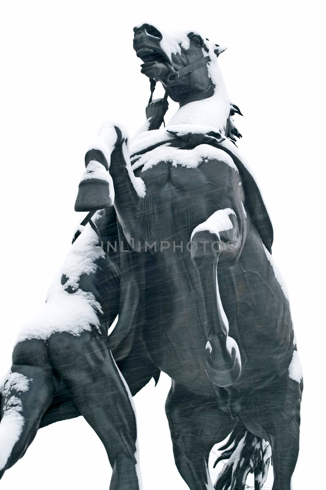 "Taming of Horses"" Monument while snowing, a public ensemble built in 1841 in St. Petersburg, Russia. This is a public (!) monument and no one can have a copyright of the sculpture."