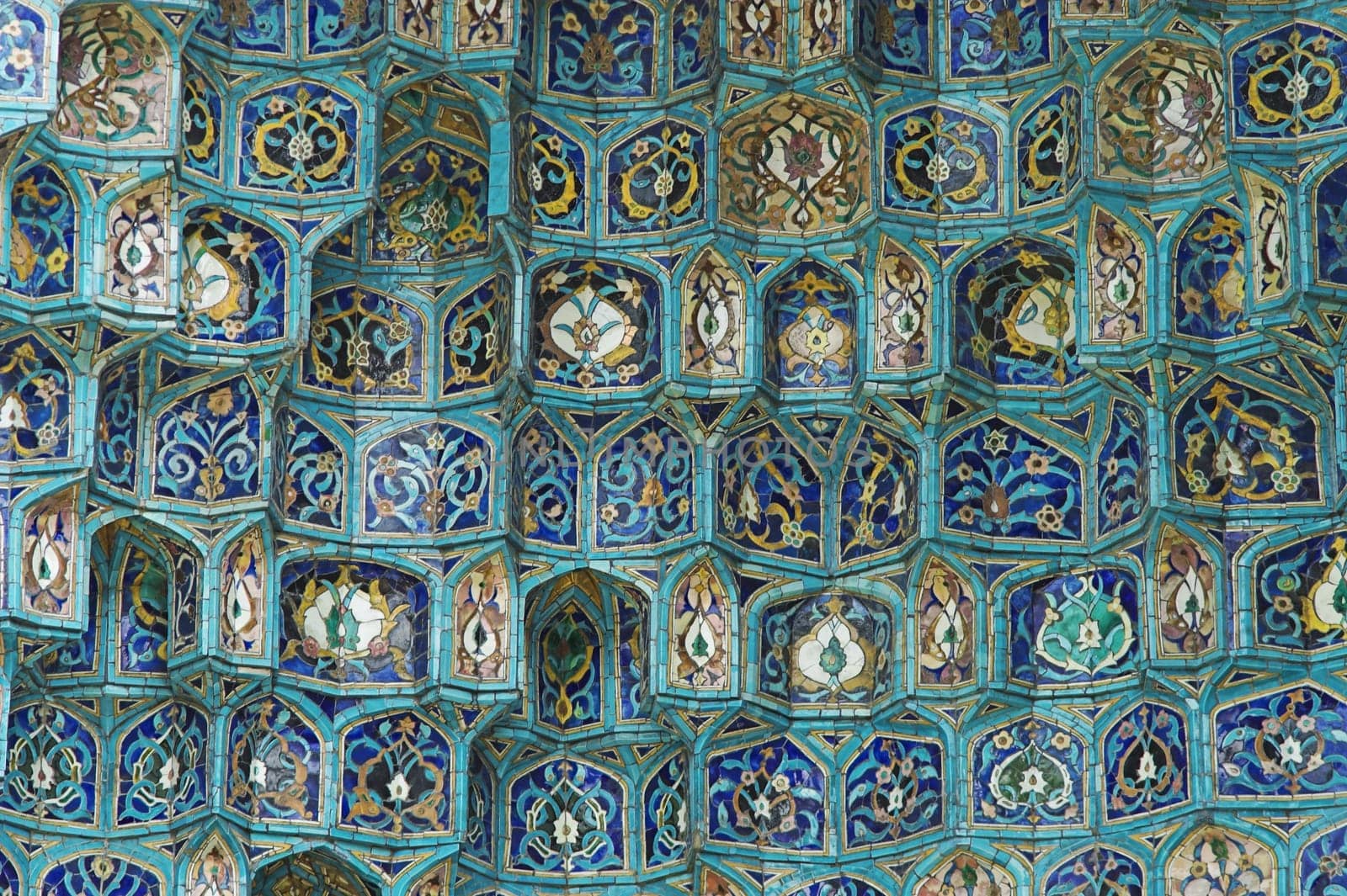Fragment of a tiled wall with Arabic mosaic of an ancient mosque in Saint Petersburg, Russia.
