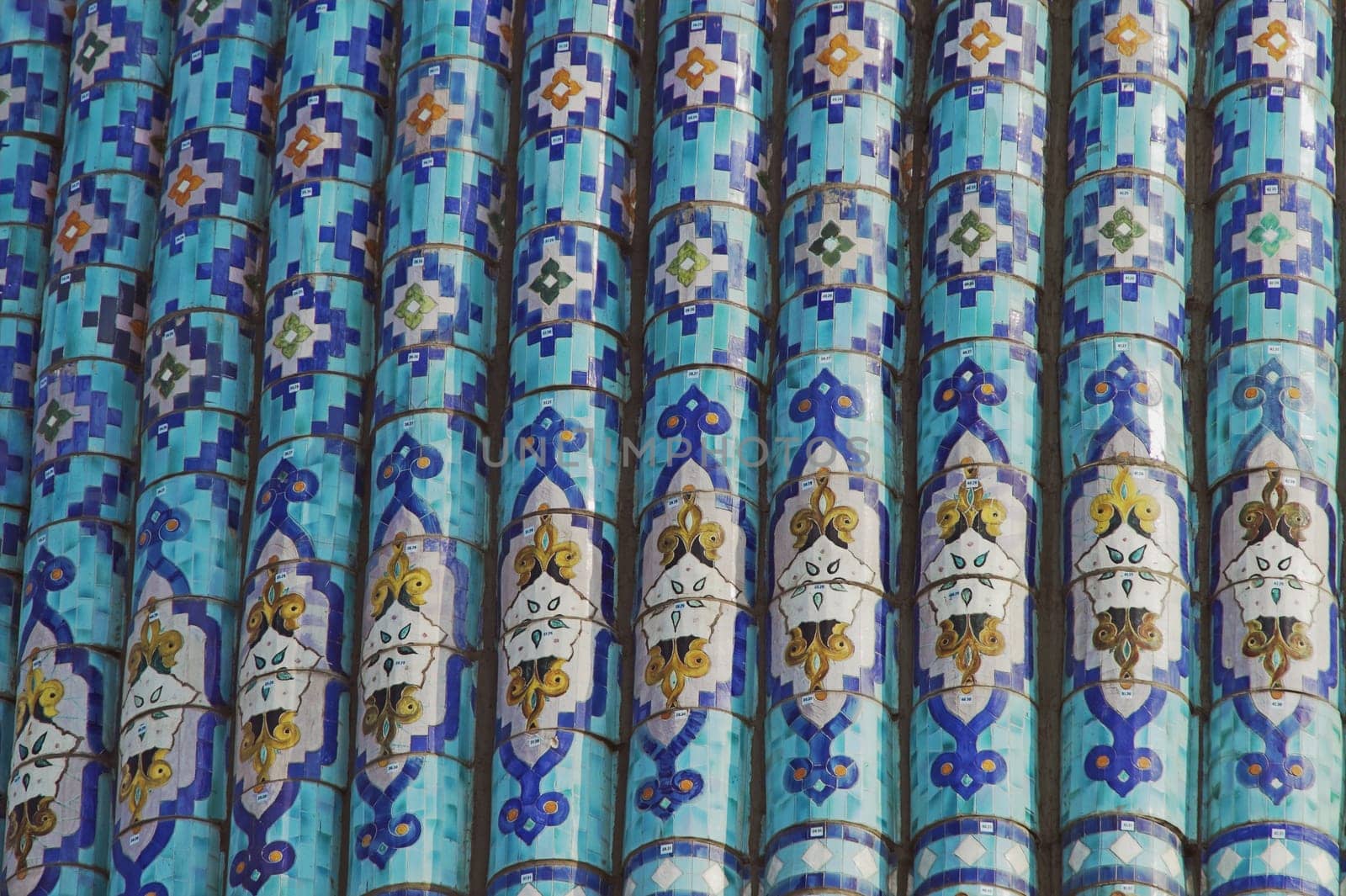 Fragment of a tiled wall with Arabic mosaic of an ancient mosque in Saint Petersburg, Russia.