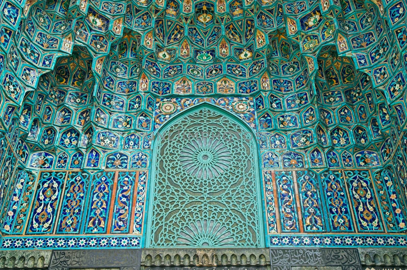 Fragment of a tiled wall with Arabic mosaic of an ancient mosque in Saint Petersburg, Russia.