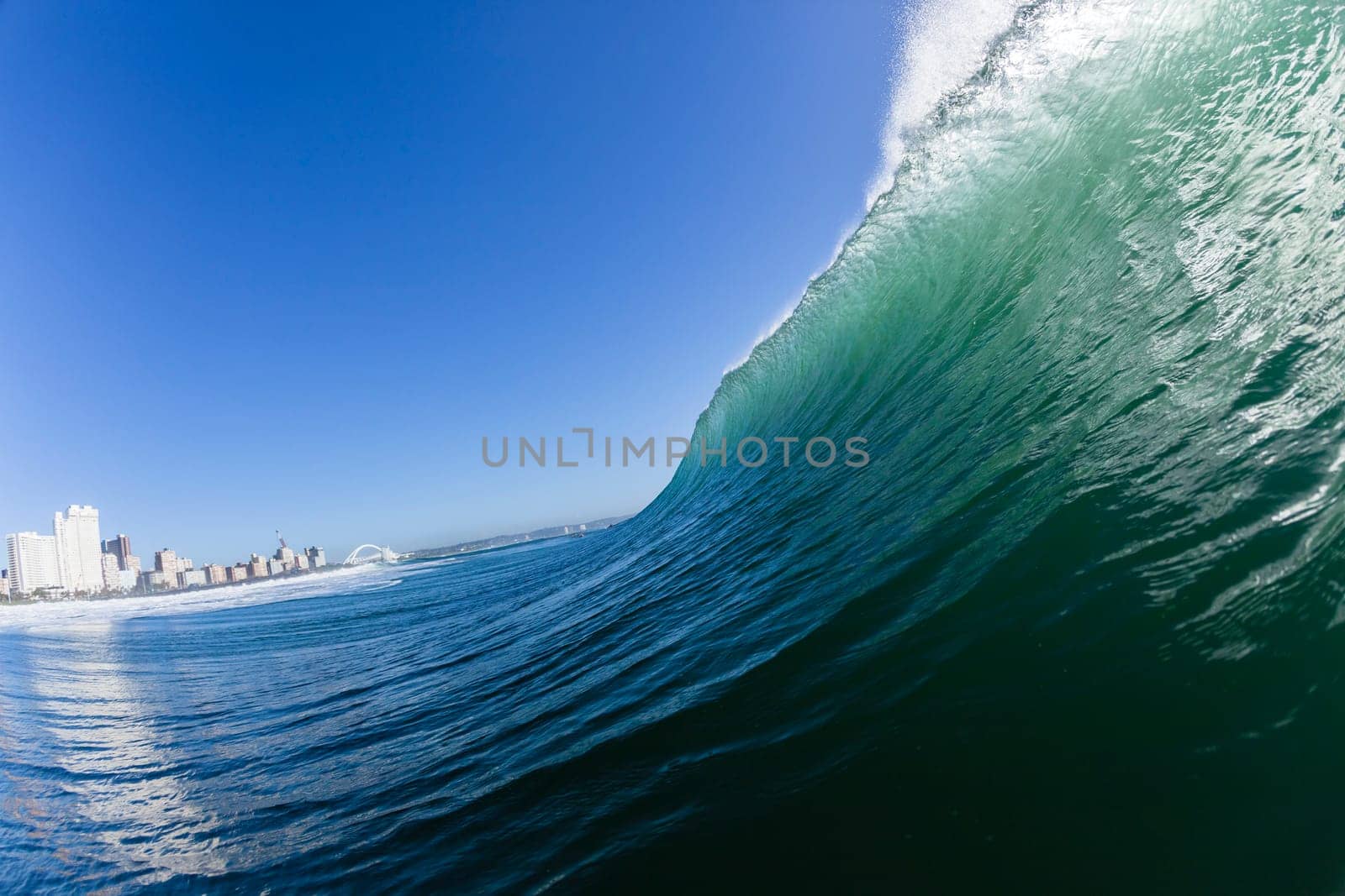 Ocean wave water crashing swell morning backlight
