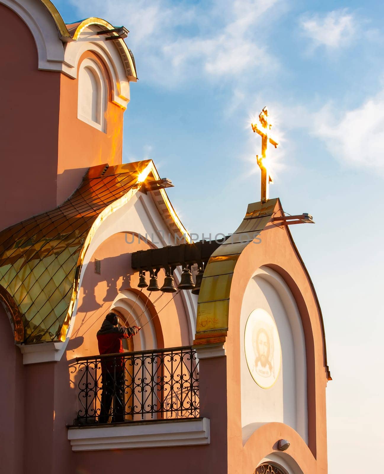 The bell-ringer in orthodoxy church bell tower
