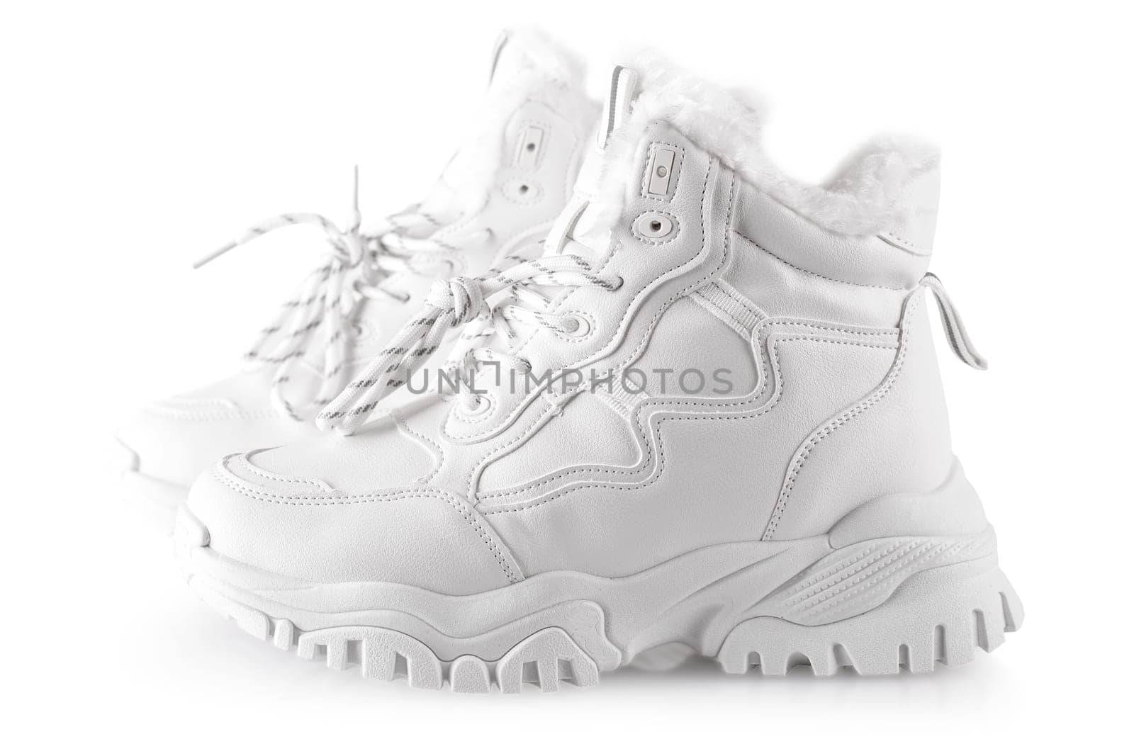 The White sneakers for women isolated on white background.