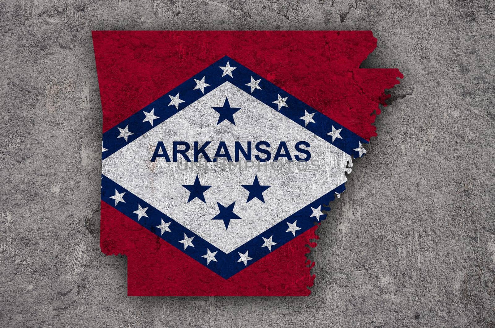 Map and flag of Arkansas on weathered concrete