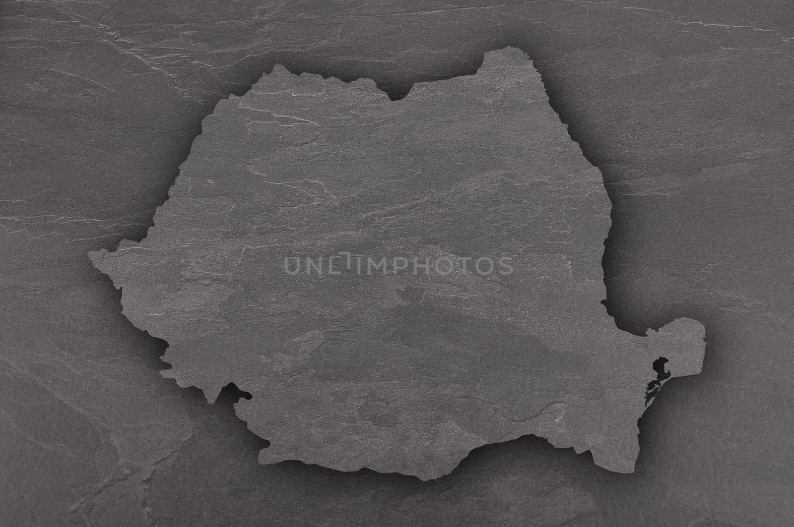 Map of Romania on dark slate