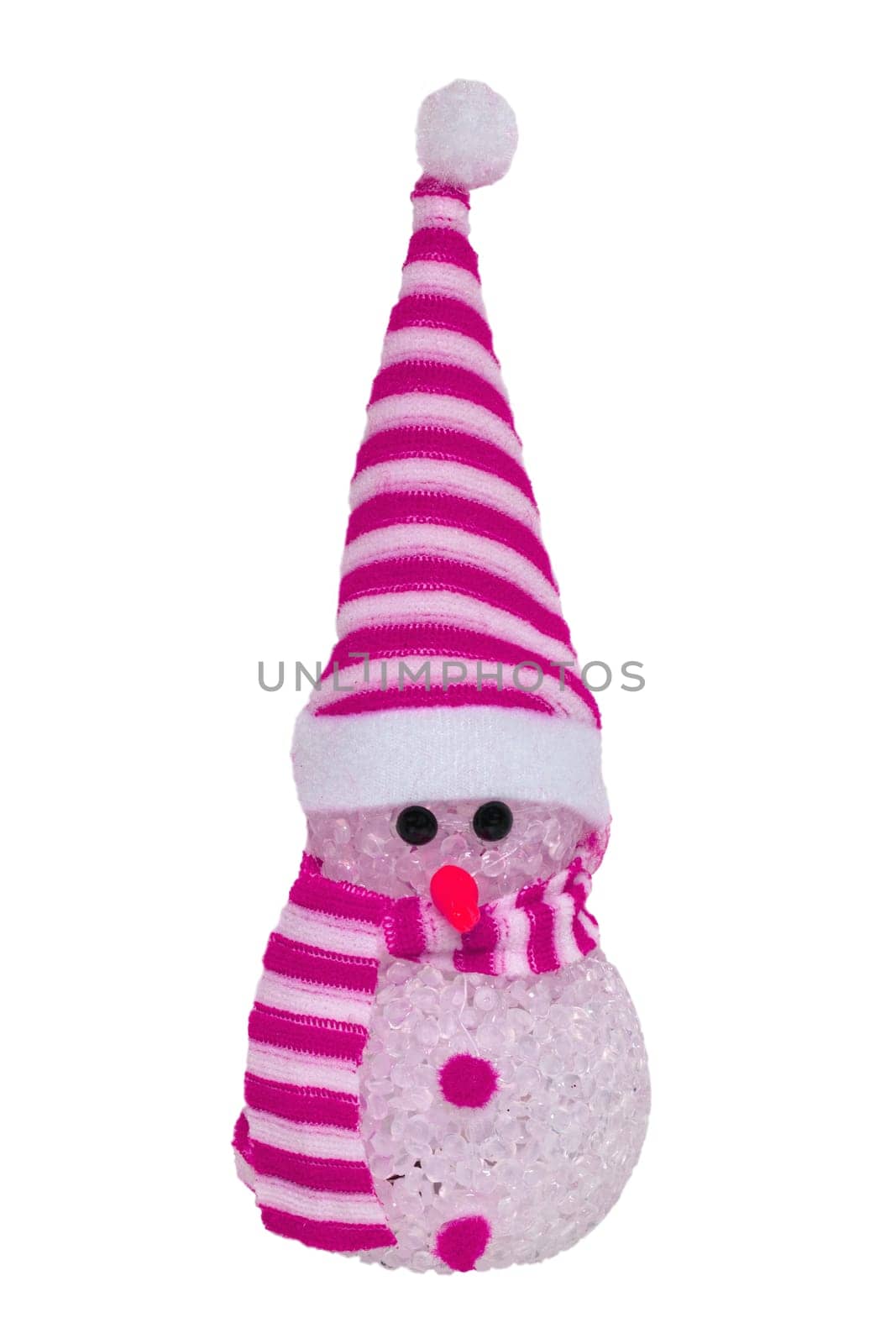 Christmas decorations isolated. Close-up of a pink illuminated happy cute winter snowman with red white striped hat and scarf isolated on a white background. Macro photograph.