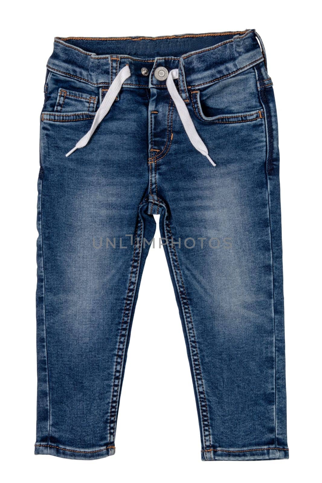 Jeans isolated. Trendy stylish blue denim pants or trousers with white ribbon for child boy isolated on a white background. Jeans summer and autumn fashion. Front view.