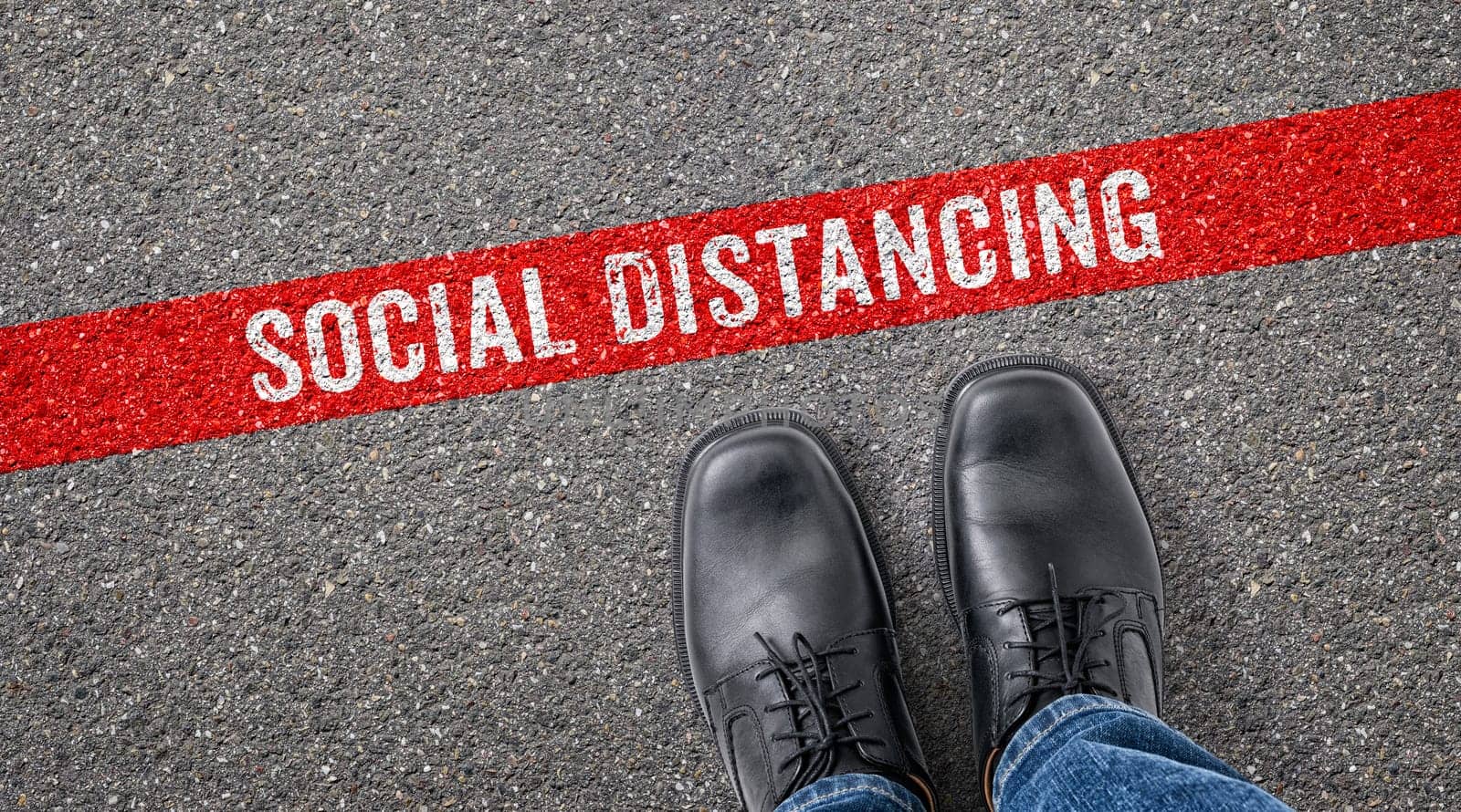 Red line on asphalt - Social Distancing