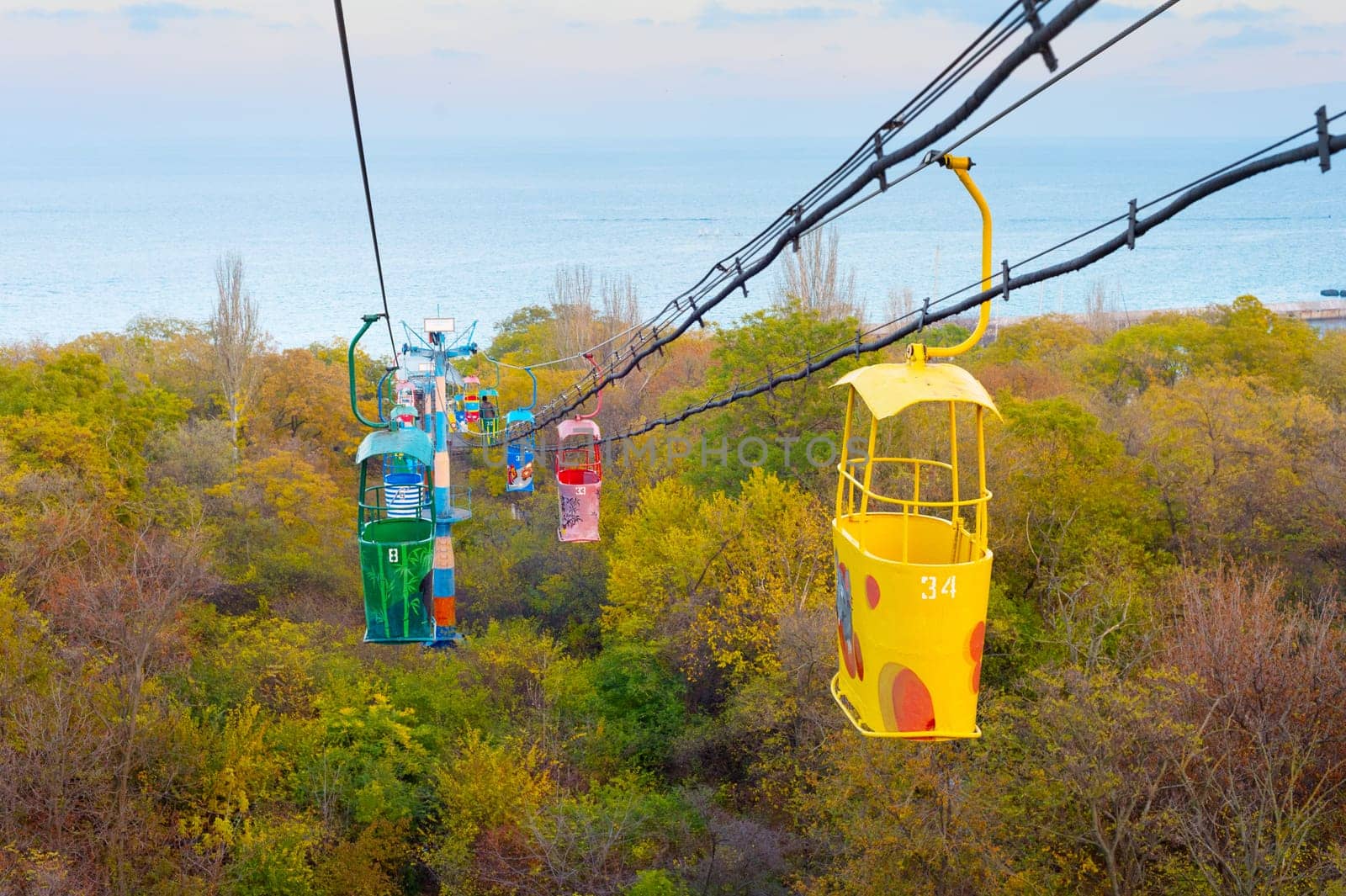ODESSA, UKRAINE - NOVEMBER 26, 2020: View of a famous cable car in Odessa with the sea in the background.