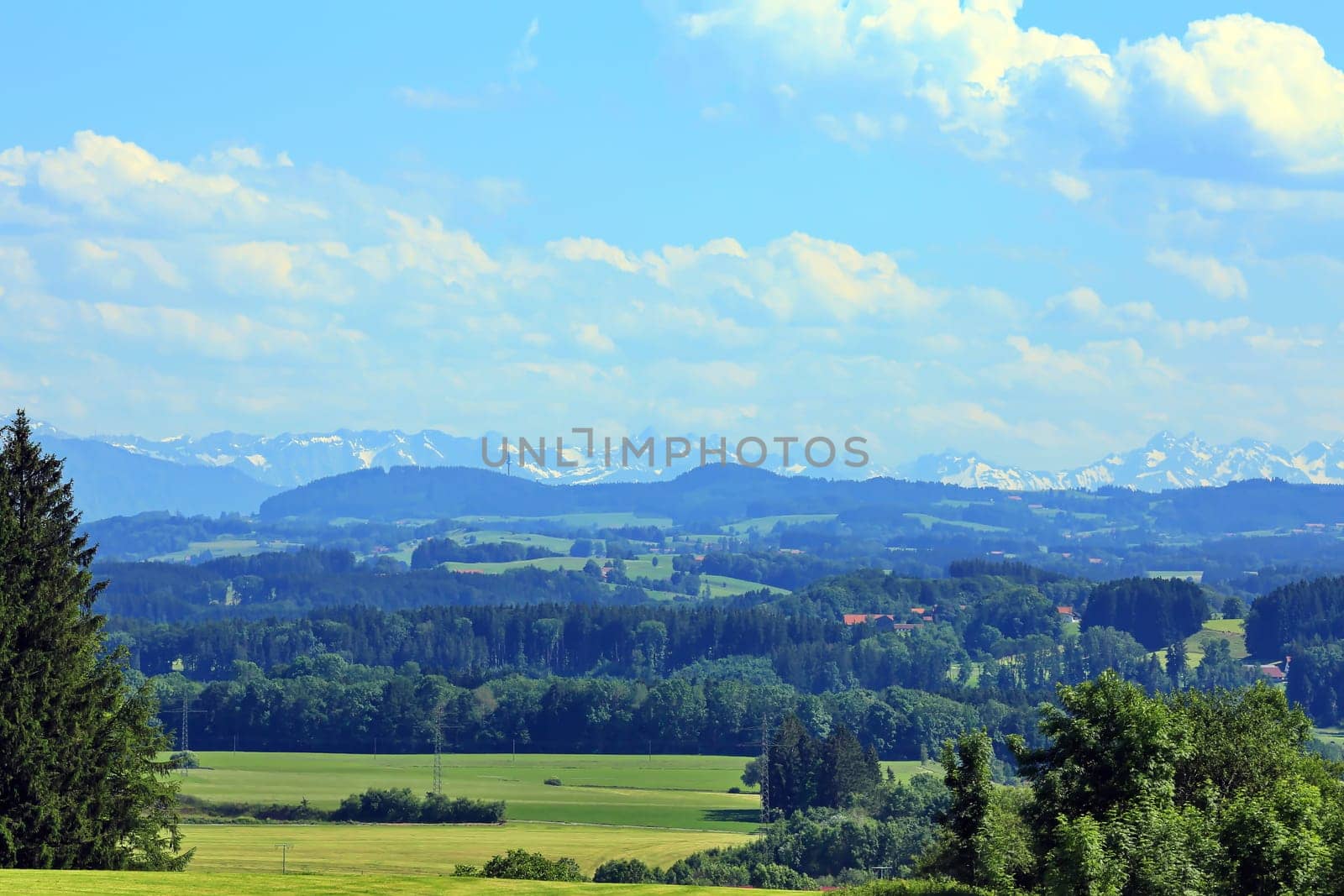 Alpine foothills with a view of the Alpine panorama